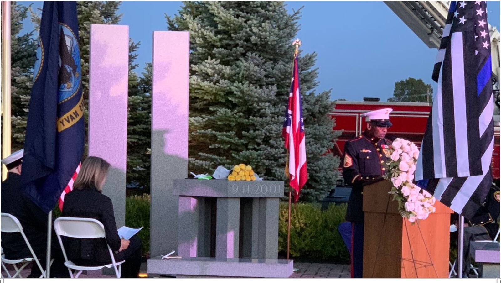 Jerry Ferris, right, a Warren County Veterans Services Commission member and a Vietnam combat veteran, speaks at the Warren County 9/11 Remembrance Ceremony. Hundreds of people attended the candlelight vigil at the Warren County 9/11 Memorial. ED RICHTER/STAFF