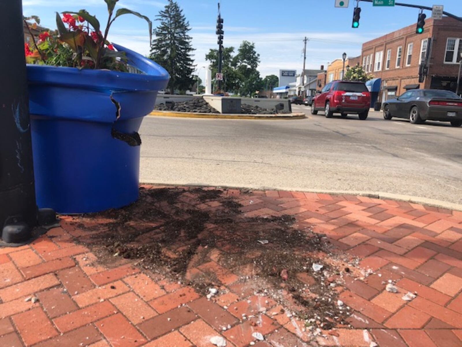 A one-vehicle crash “took out a good portion” of the Fairborn Veterans Memorial and closed in the intersection of Main and Central for several hours, according to the city. NICK BLIZZARD/STAFF