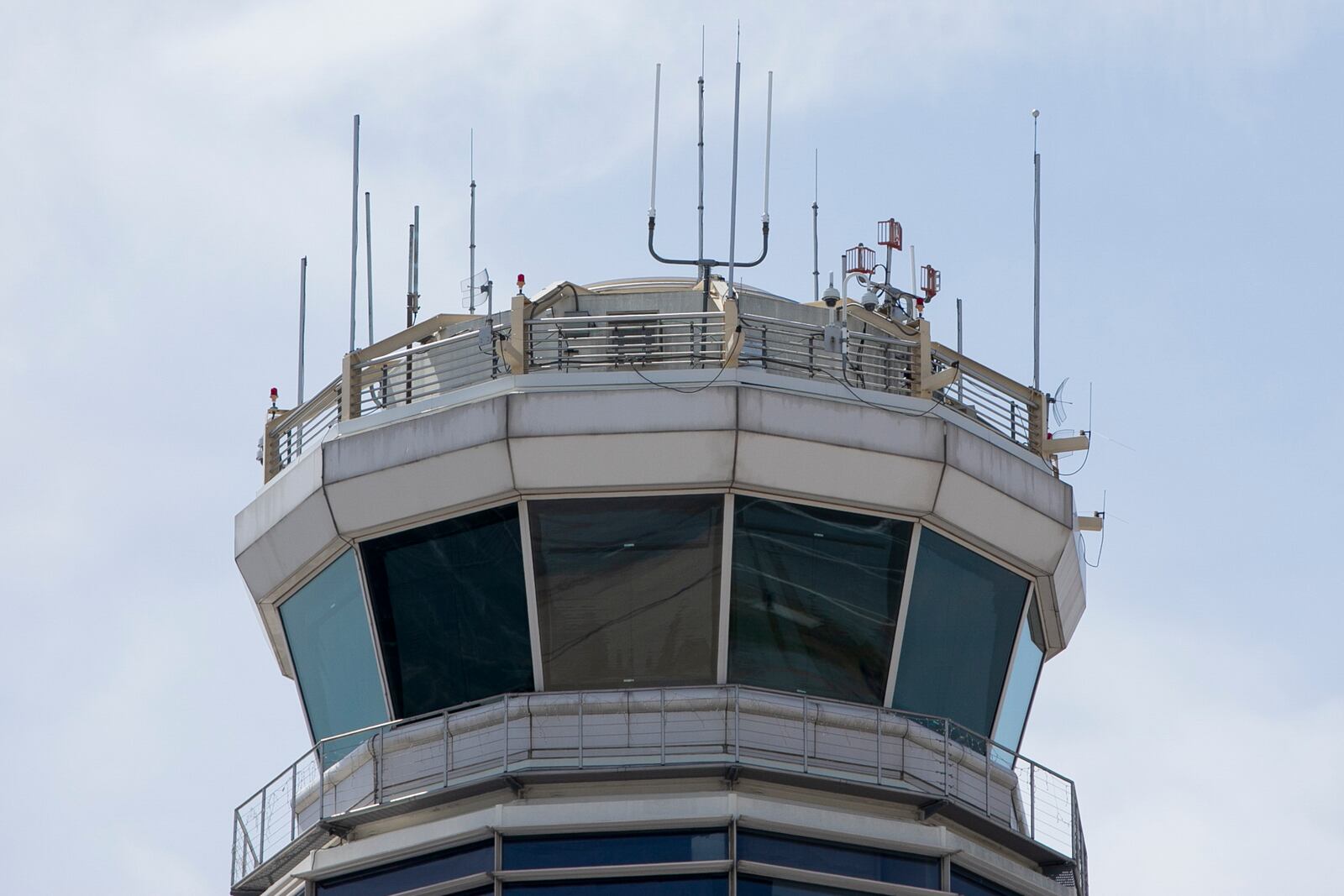 FILE - The air traffic control tower at Ronald Reagan Washington National Airport is seen, June 2, 2021, in Arlington, Va. (AP Photo/Jenny Kane, File)