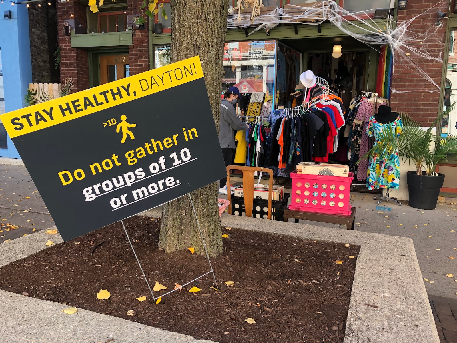 A sign reminding people to be safe while in the Oregon District. CORNELIUS FROLIK / STAFF