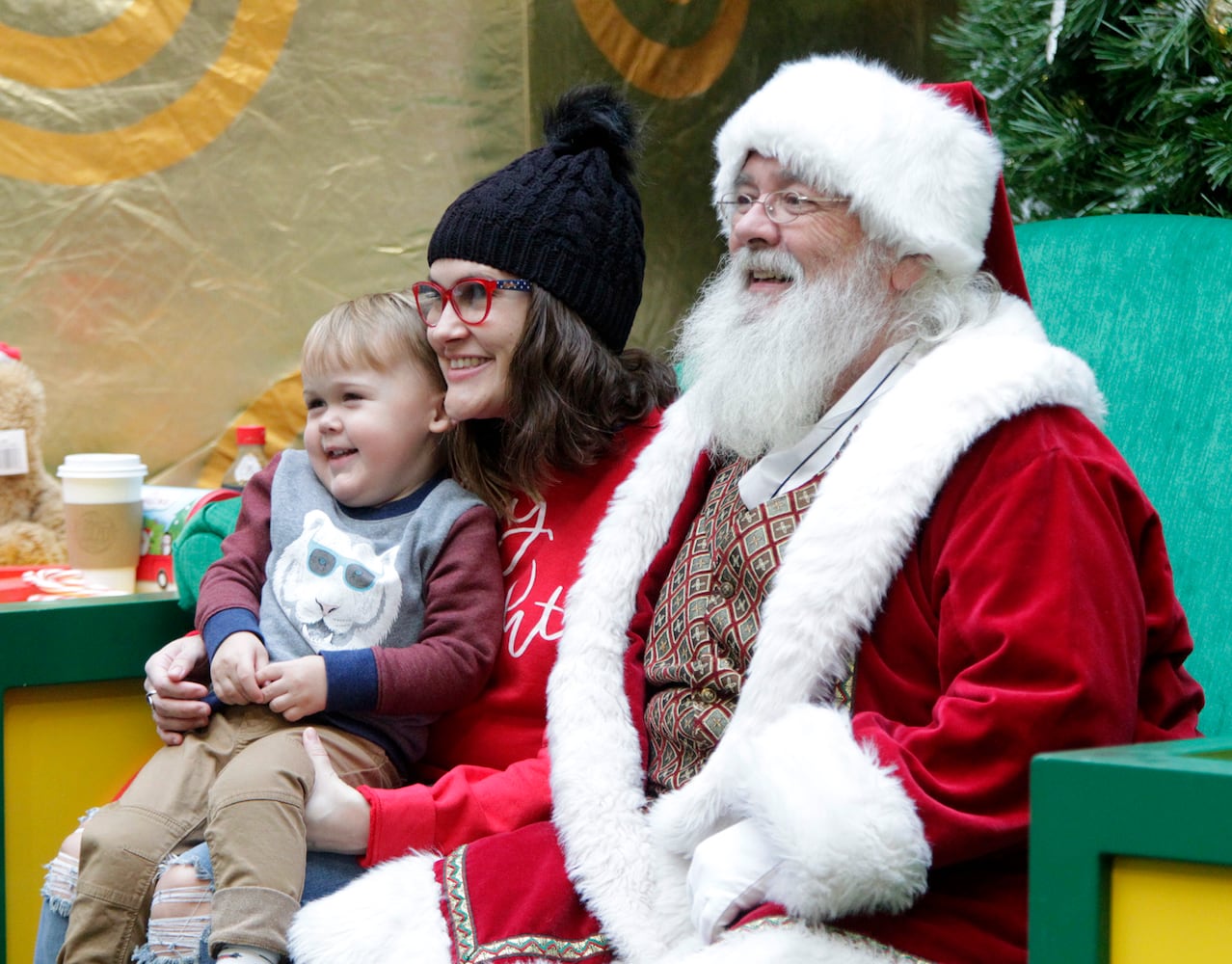 PHOTOS: A visit with Santa Claus makes the holiday season magical