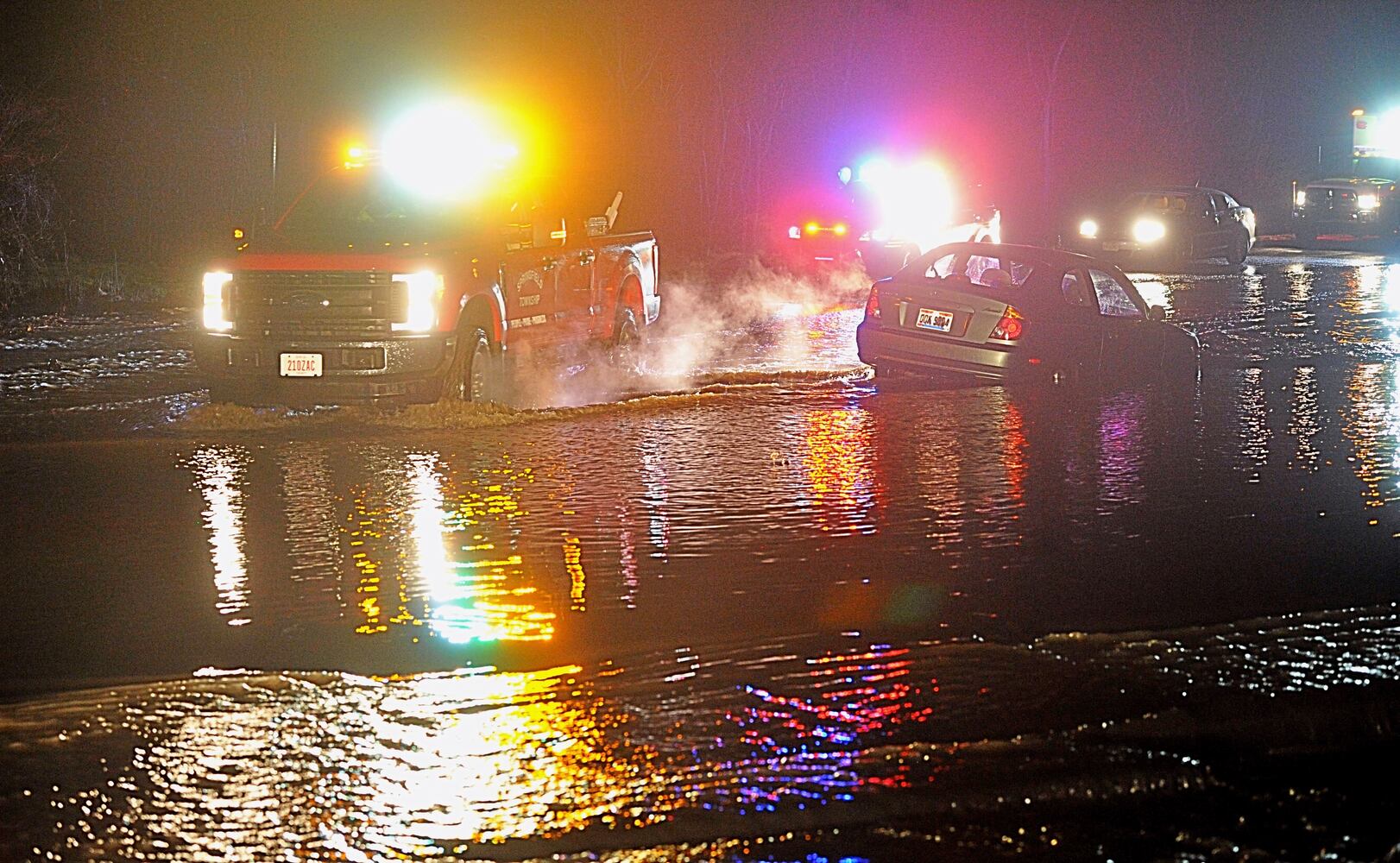 PHOTOS: Storms cause flooding, damage on first day of spring