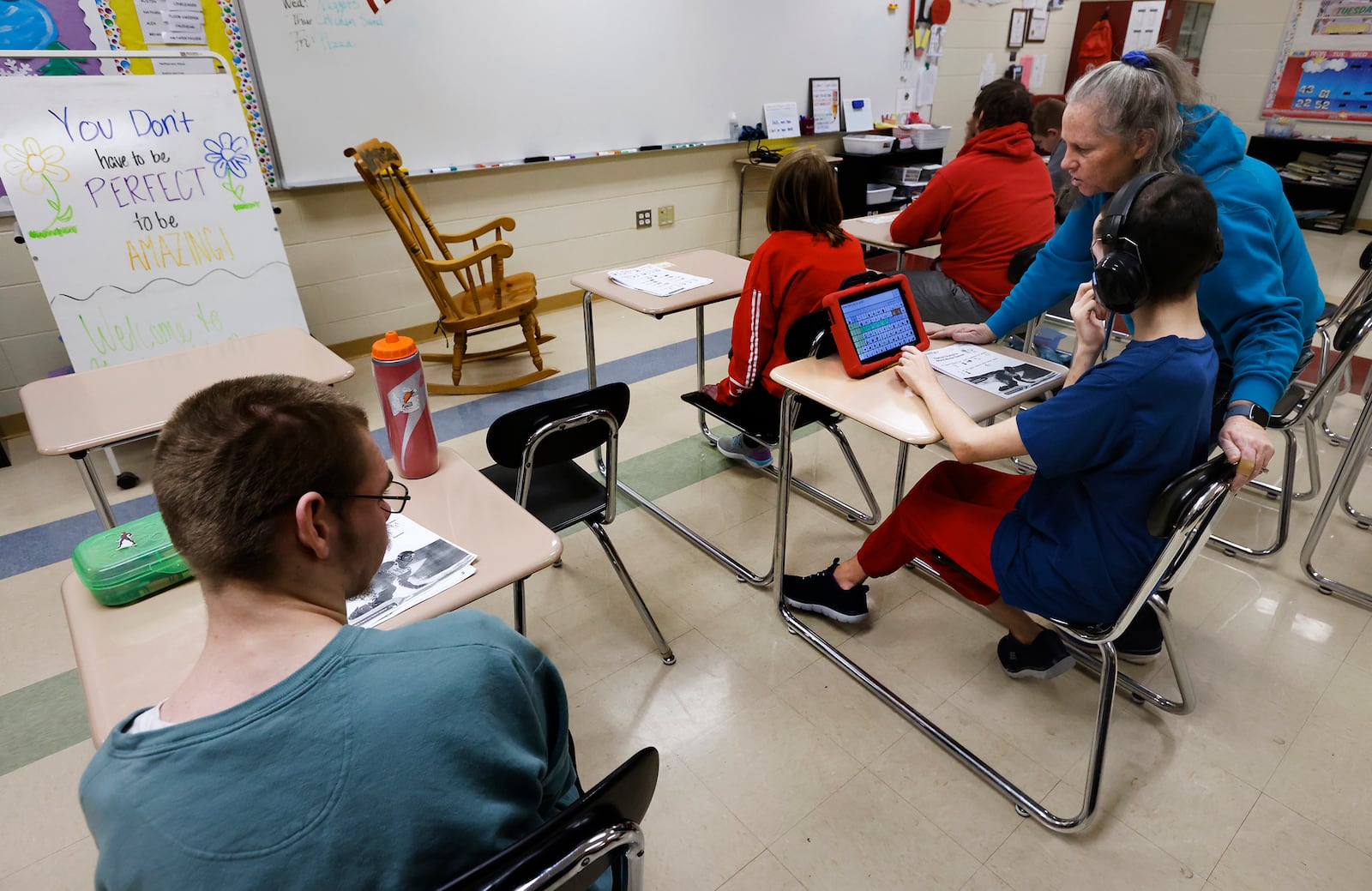 Tecumseh High School Para Professional works with students Tuesday, March 4, 2025. The district has a budget reduction plan in place over the next several years. This includes to cut over $800,000 for the 2025-26, over $600,000 if the levy doesn't pass in May, and another over $1 million if two renewal levies fail and new money is not passed. MARSHALL GORBY\STAFF