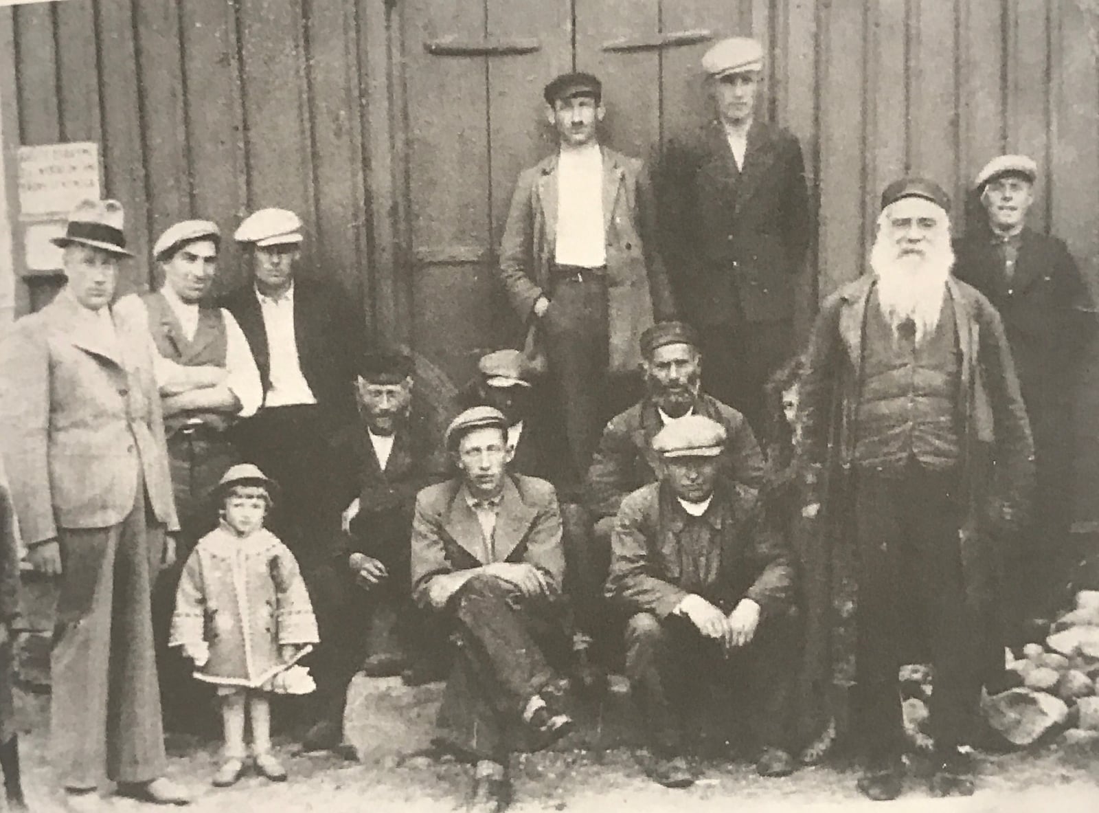 A photo of some of Anschel Frydman’s family members taken in the early 1930s in Poland. Anschel’s father, Joseph, is the second man from the left. This is the only photo known to exist showing Joseph.  A cousin whom he stayed with in the Radom Ghetto is the first man from the left. The man with the big white beard is Anschel’s great uncle. Twelve of the 14 people in the photo – including the two small children (one is peeking around the man with the white beard) – were killed in the Holocaust. Anschel found the photo decades later in a cousin’s old photo album in Brazil. CONTRIBUTED