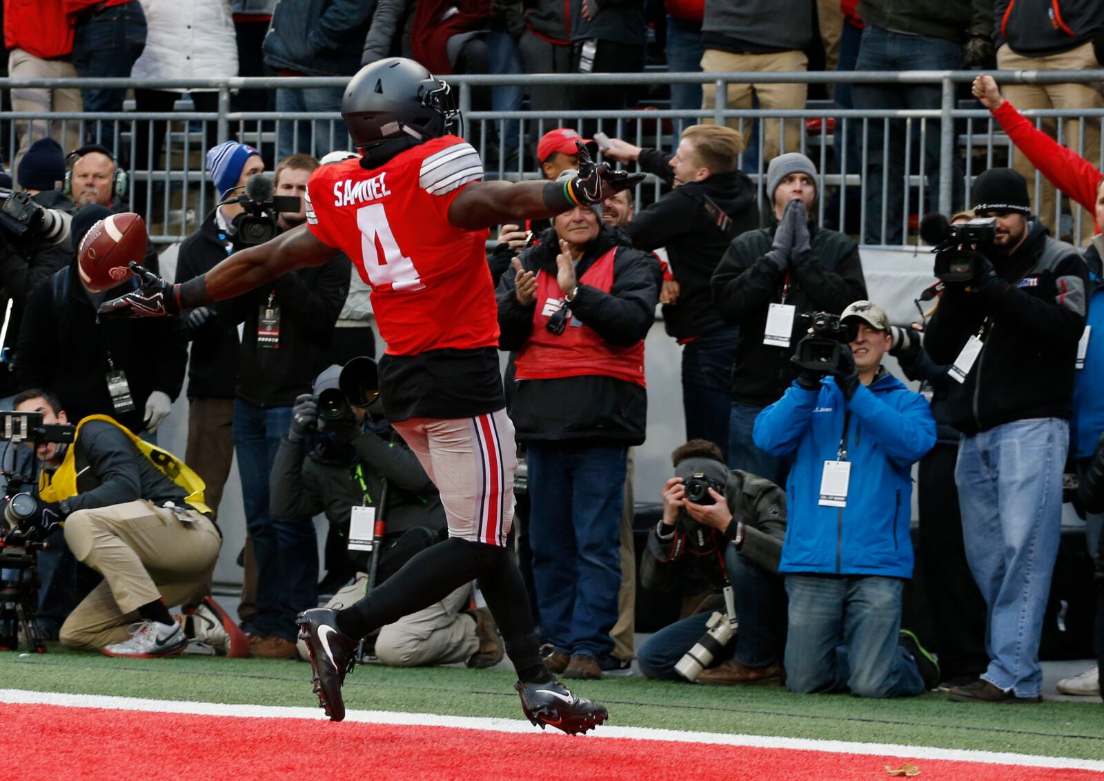 Ohio State running back Curtis Samuel celebrates his touchdown against Michigan during the second overtime of an NCAA college football game Saturday, Nov. 26, 2016, in Columbus, Ohio. Ohio State beat Michigan 30-27 in double overtime. (AP Photo/Jay LaPrete)