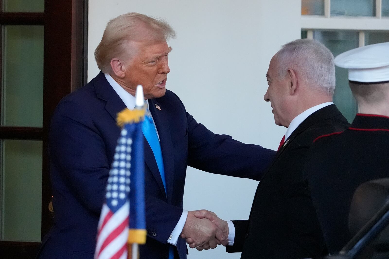 President Donald Trump greets Israeli Prime Minister Benjamin Netanyahu as he arrives at the West Wing of the White House, Tuesday, Feb. 4, 2025, in Washington. (AP Photo/Alex Brandon)