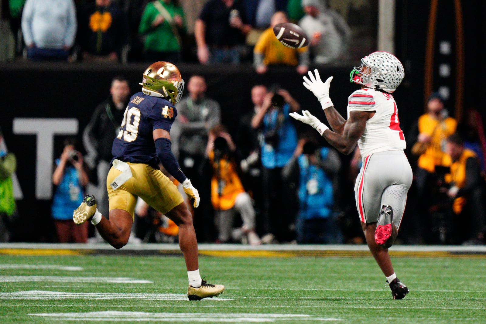 Ohio State wide receiver Jeremiah Smith catches a pass against Notre Dame during second half of the College Football Playoff national championship game Monday, Jan. 20, 2025, in Atlanta. (AP Photo/Jacob Kupferman)