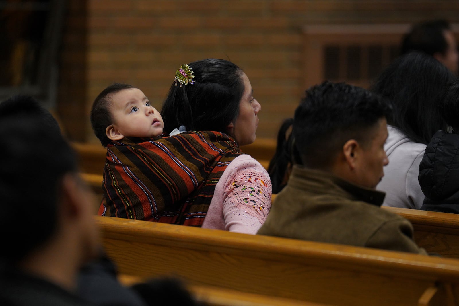 Congregants attend the Spanish-language Mass at St. Mary’s Catholic Church on Saturday, Oct. 19, 2024, in Worthington, Minn. (AP Photo/Jessie Wardarski)