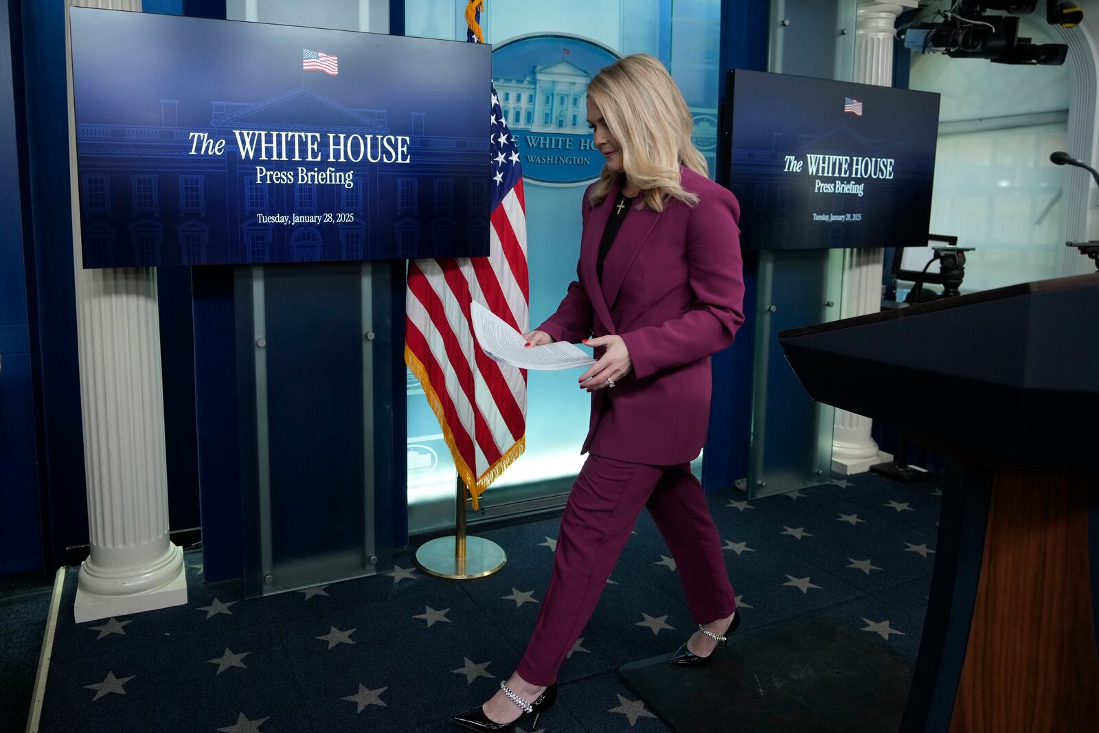 White House press secretary Karoline Leavitt walks off after speaking at the daily briefing at the White House in Washington Tuesday, Jan. 28, 2025. (AP Photo/Ben Curtis)