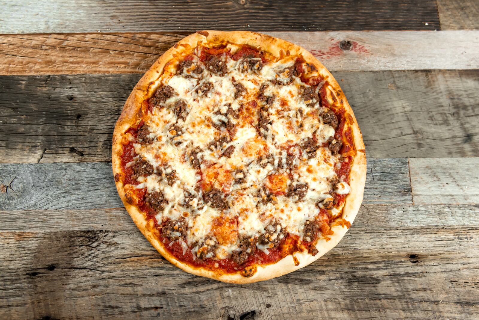 The Impossible Pizza features Giordano’s signature sausage recipe prepared with Impossible meat made from plants.