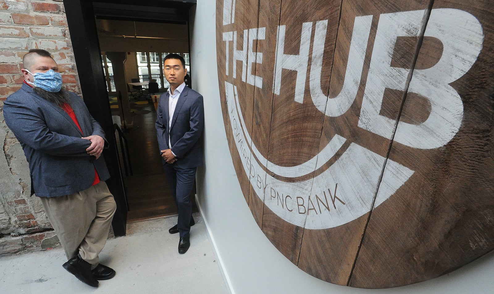 Luis Estevez, left and Yuxing Wang, inside The Hub powered by PNC in the Arcade. MARSHALL GORBY\STAFF