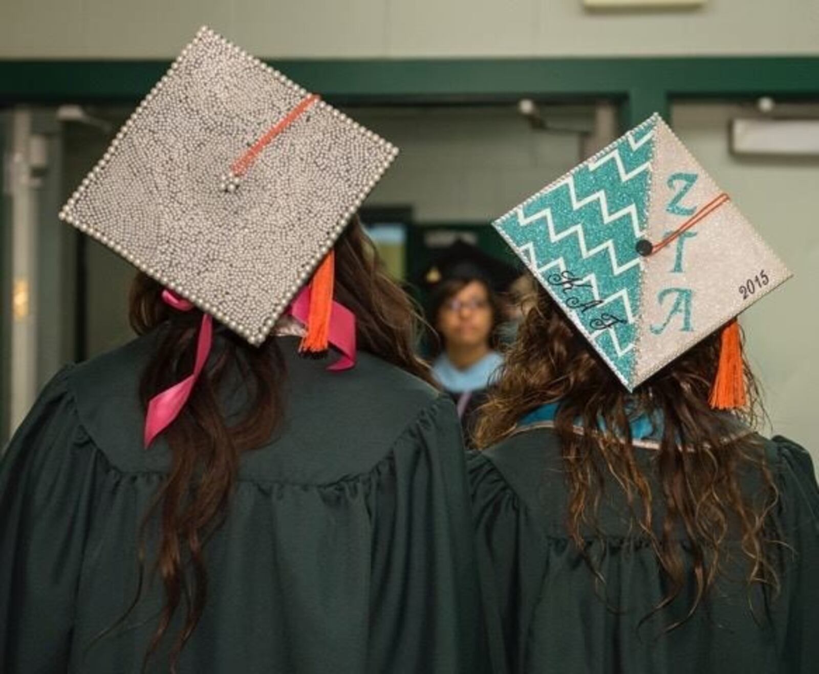 Katherine "Katy" Hitchcock is shown at left during her Wright State University graduation. She placed pearls on her cap. WRIGHT STATE UNVIERSITY / CONTRIBUTED