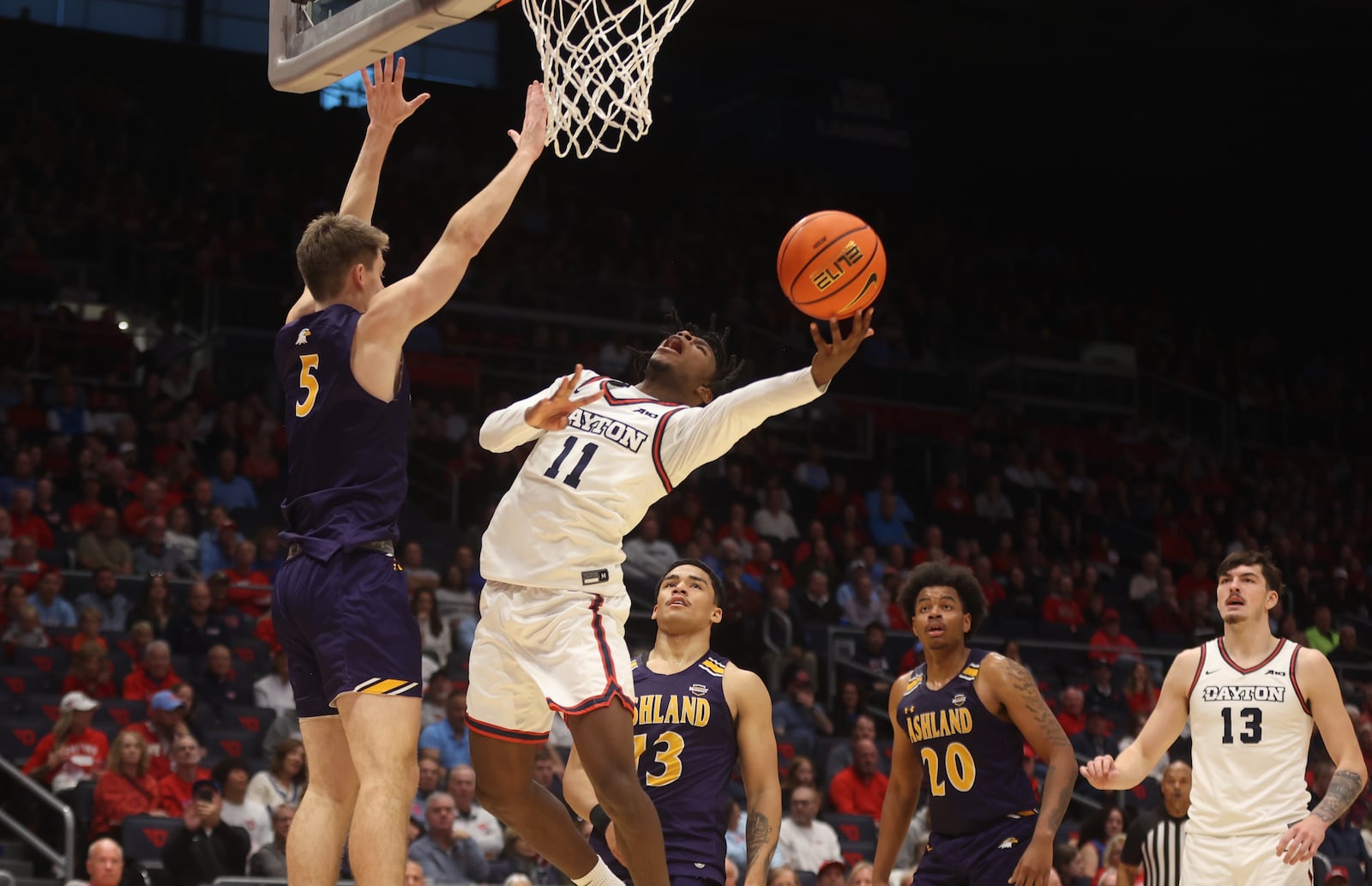 Dayton's Malachi Smith shoots against Ashland in an exhibition game on Saturday, Oct. 26, 2024, at UD Arena. David Jablonski/Staff