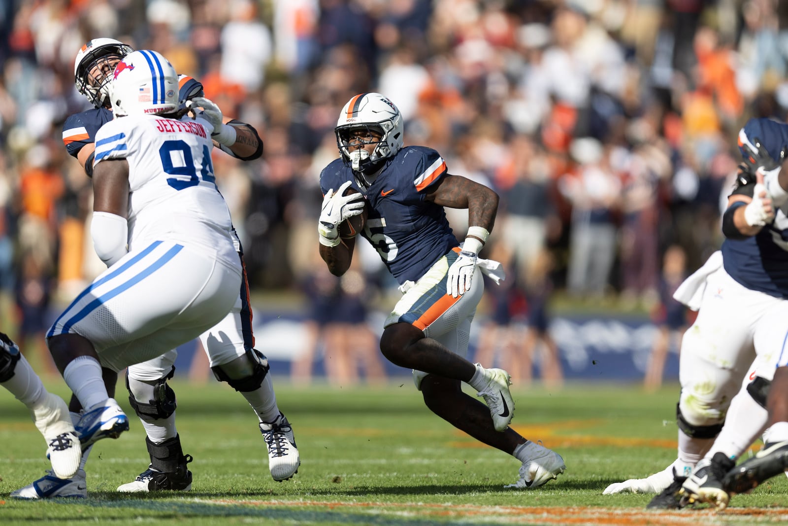 Virginia running back Kobe Pace (5) runs against Southern Methodist during the first half of an NCAA college football game, Saturday, Nov. 23, 2024, in Charlottesville, Va. (AP Photo/Mike Kropf)