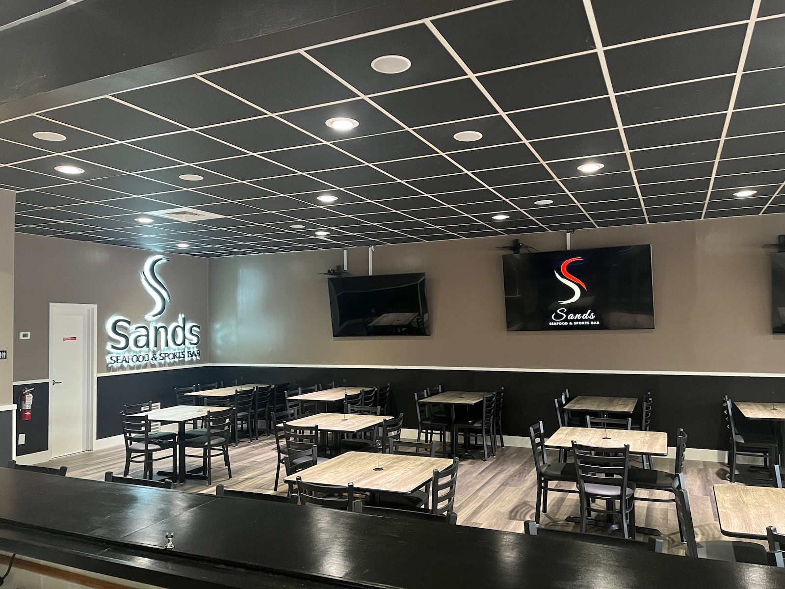 Sands Seafood and Sports Bar plans to offer the best of both worlds with a cross between a sports bar and a high-dining experience when it opens in August. CONTRIBUTED