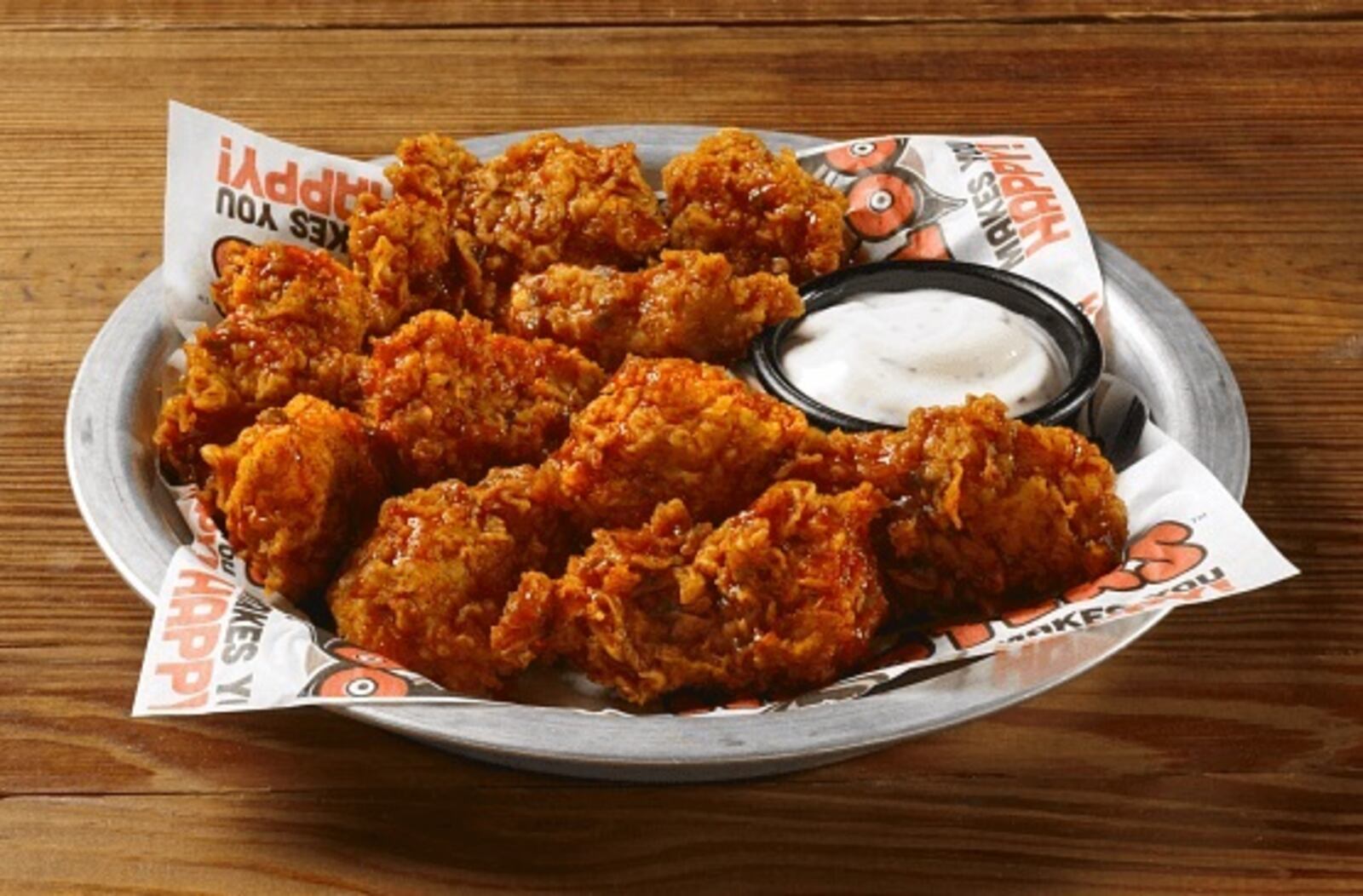 Hooters will be offering dine-in guests 10 free boneless wings with the purchase of any 10 wings on National Chicken Wing Day. CONTRIBUTED