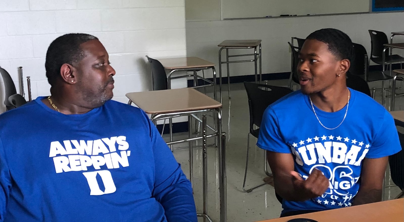 Dunbar High School valedictorian Myles Lacking talks about the father-son, teacher-student and coach-athlete relationships he has with his dad, English teacher and football coach James Lacking. JEREMY P. KELLEY / STAFF