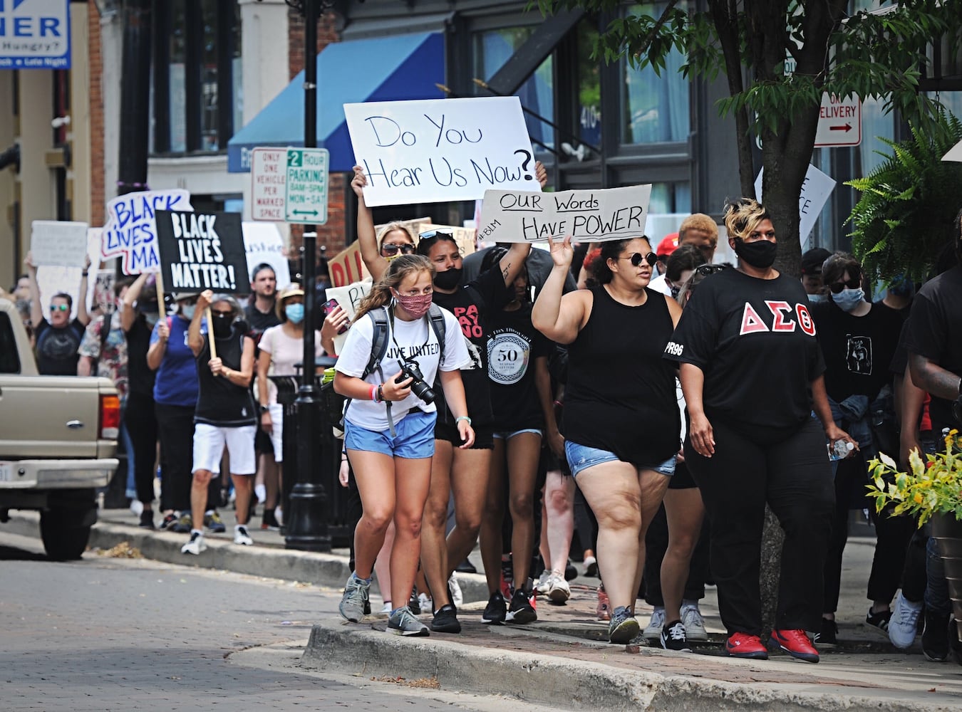 PHOTOS: Protestors march through the Oregon District Thursday