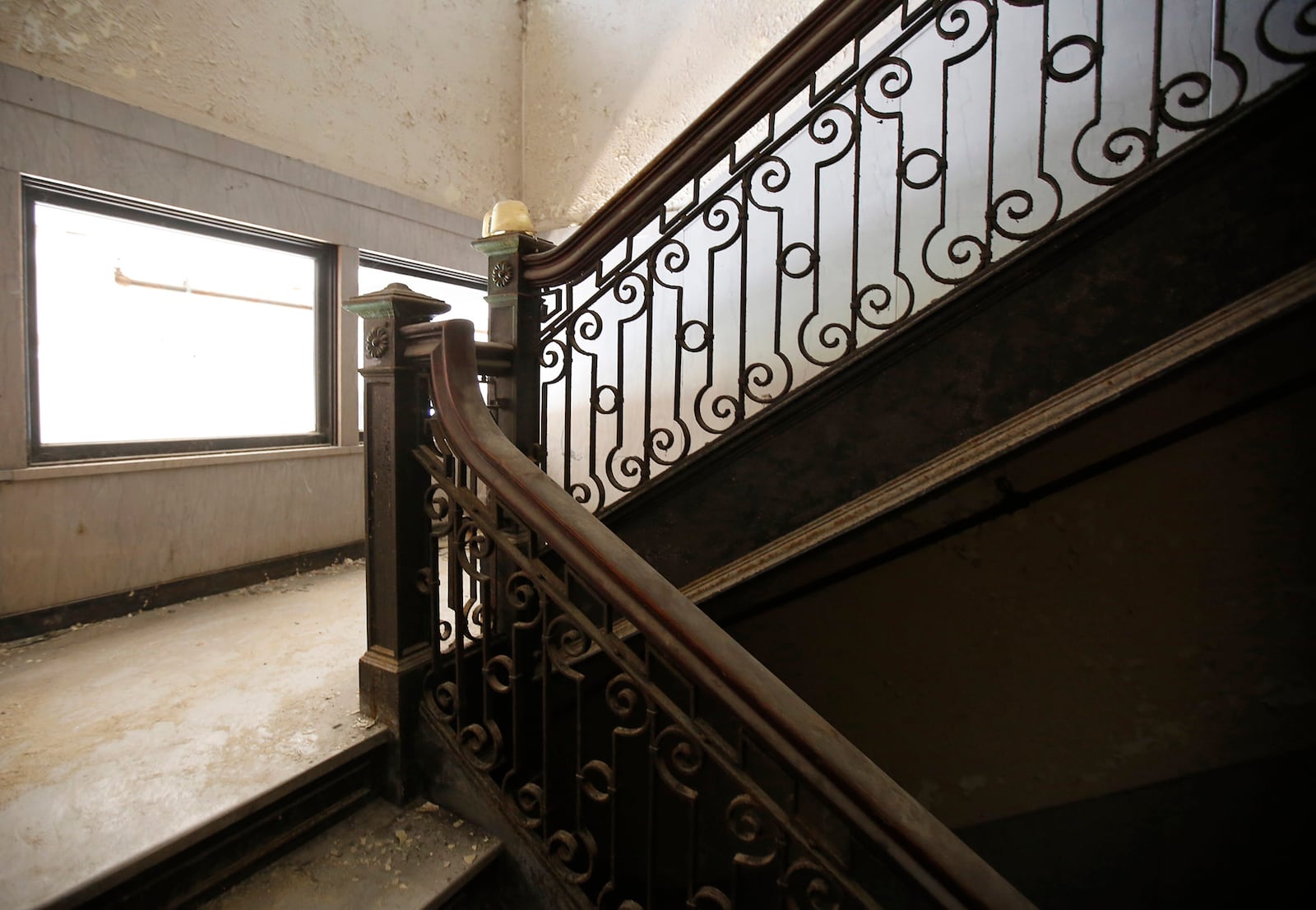 The Ludlow Street office building has terrazzo floors and marble paneling throughout.  A very grand staircase is accented with wrought iron, marble landings and treads, marble wainscotng and window trim and quarter-sawn oak hand railing.  This building will become reconfigured as living space in phase one of the Dayton Arcade renovation.   TY GREENLEES / STAFF