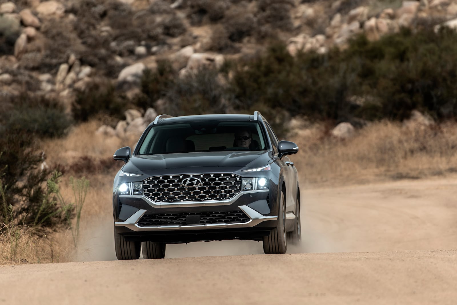 This photo provided by Hyundai shows the 2021 Santa Fe with new styling, upgraded available engines and a lot of equipment at an attractive price. (Drew Phillips/Courtesy of Hyundai Motor America via AP)