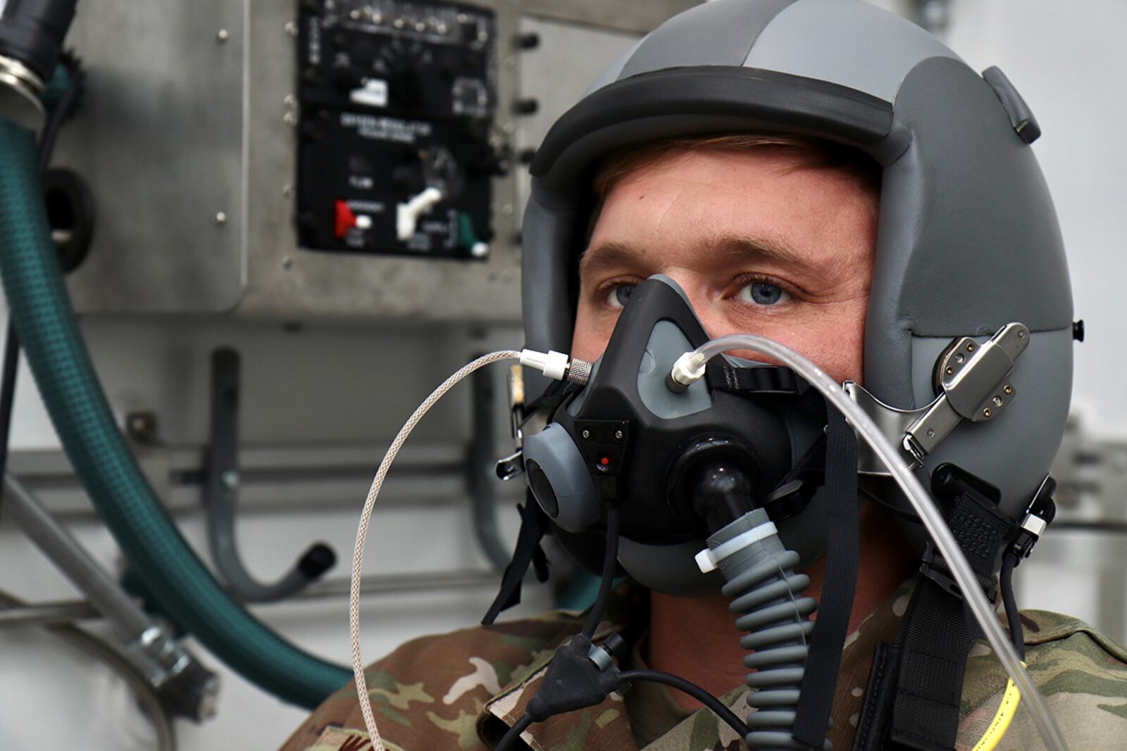 Tech. Sgt. Tyler Wineman waits for an oxygen system test to begin inside a Research Altitude Chamber at Wright Patterson Air Force Base April 15. Wineman is an aircrew flight equipment research technician assigned to the 711th Human Performance Wing, the Air Force Research Laboratory unit that operates the chambers. U.S. AIR FORCE PHOTO/JASON SCHAAP