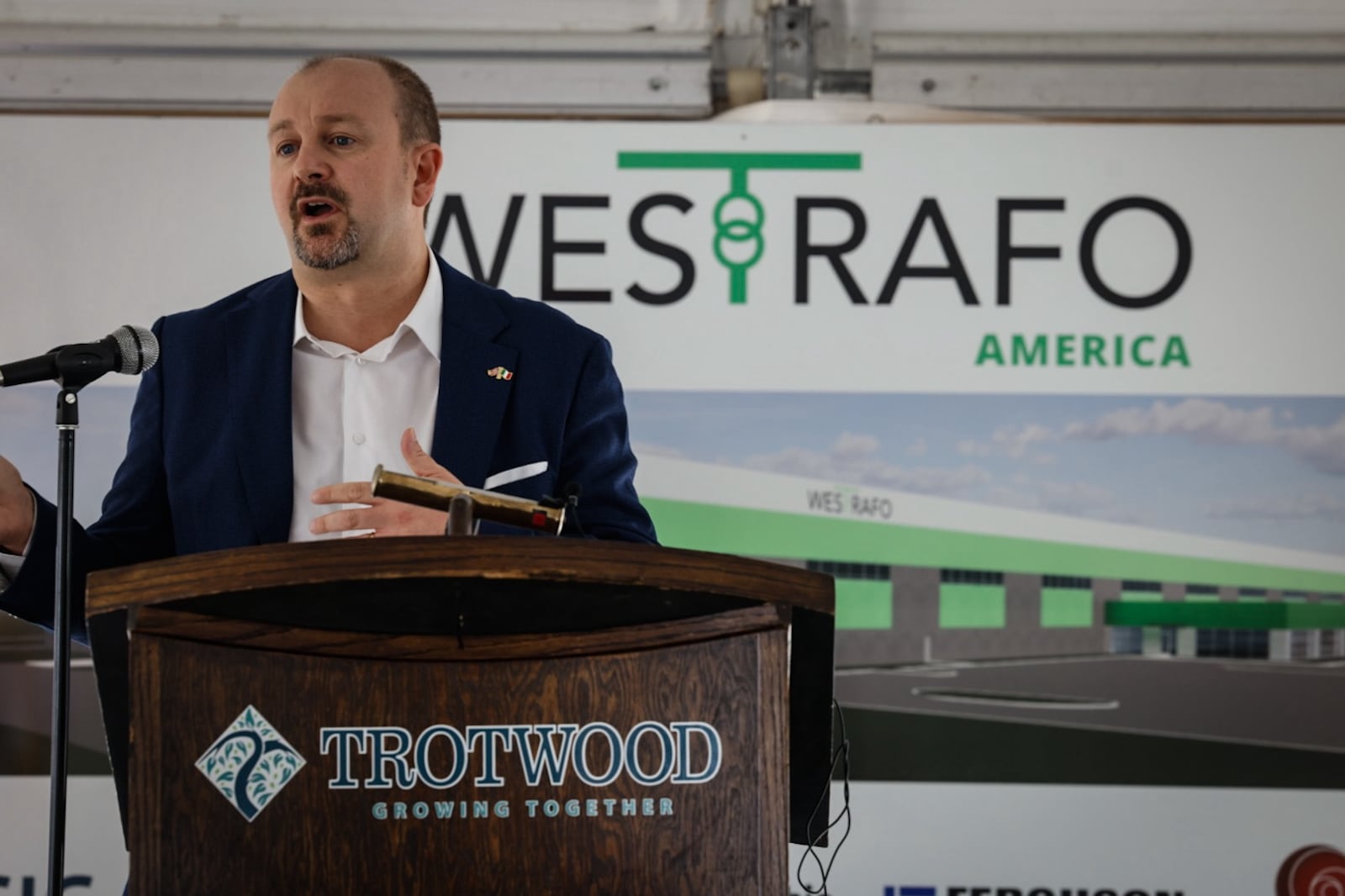 WESTRAFO America CEO Alberto Cracco talks to the crowd before the groundbreaking of his companies first manufacturing facility being built in Trotwood. WESTRAFO could have built anywhere in the country but picked Trotwood.Jim Noelker/Staff