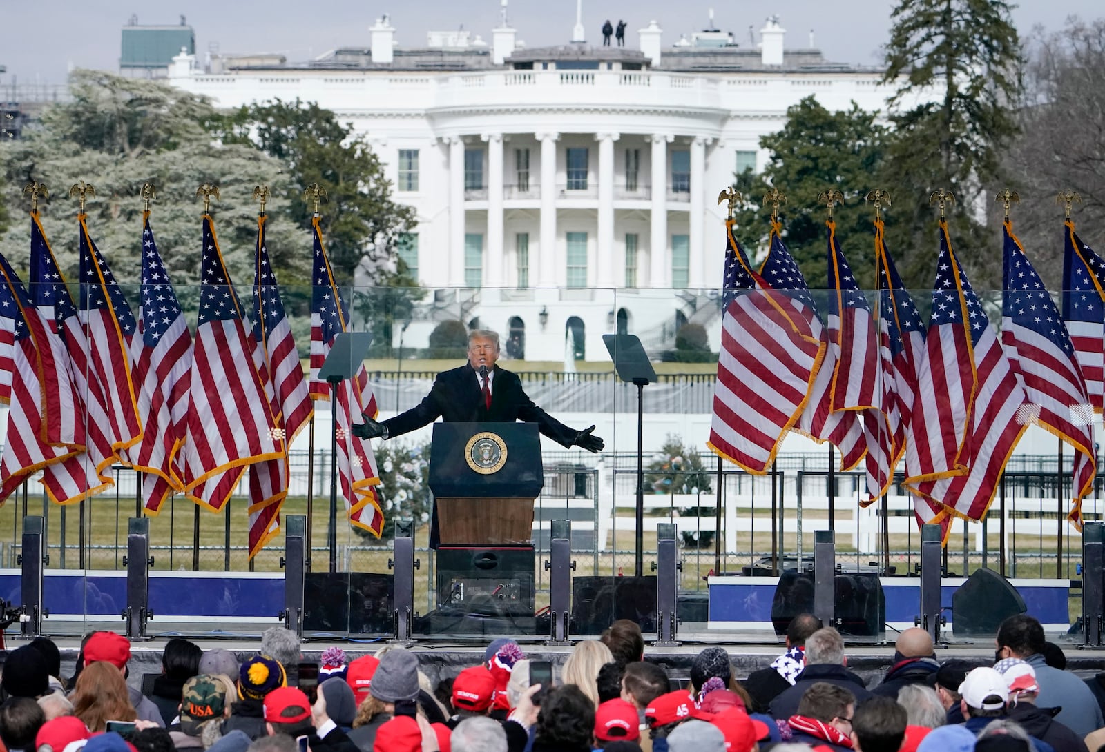 FILE - With the White House in the background, President Donald Trump speaks at a rally in Washington, Jan. 6, 2021. (AP Photo/Jacquelyn Martin, File)