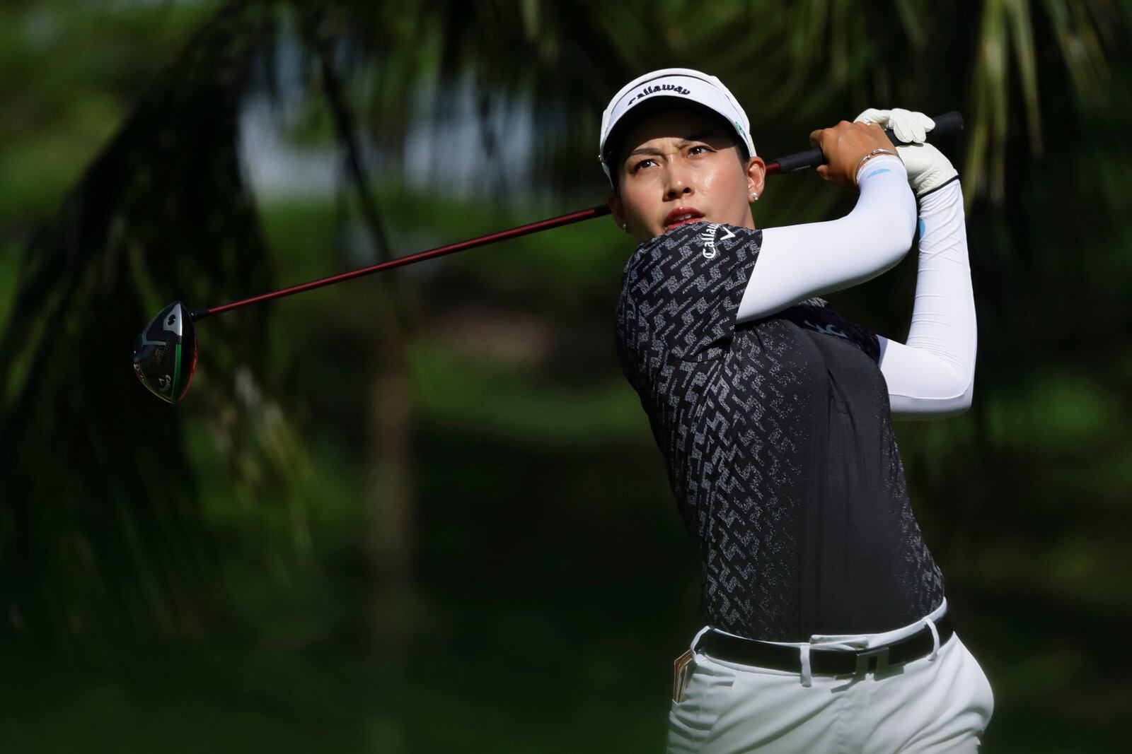 Jeeno Thitikul of Thailand tees off during the round four of the HSBC Women's World Championship 2025 at Sentosa Golf Club in Singapore, Sunday, March 2, 2025. (AP Photo/Suhaimi Abdullah)