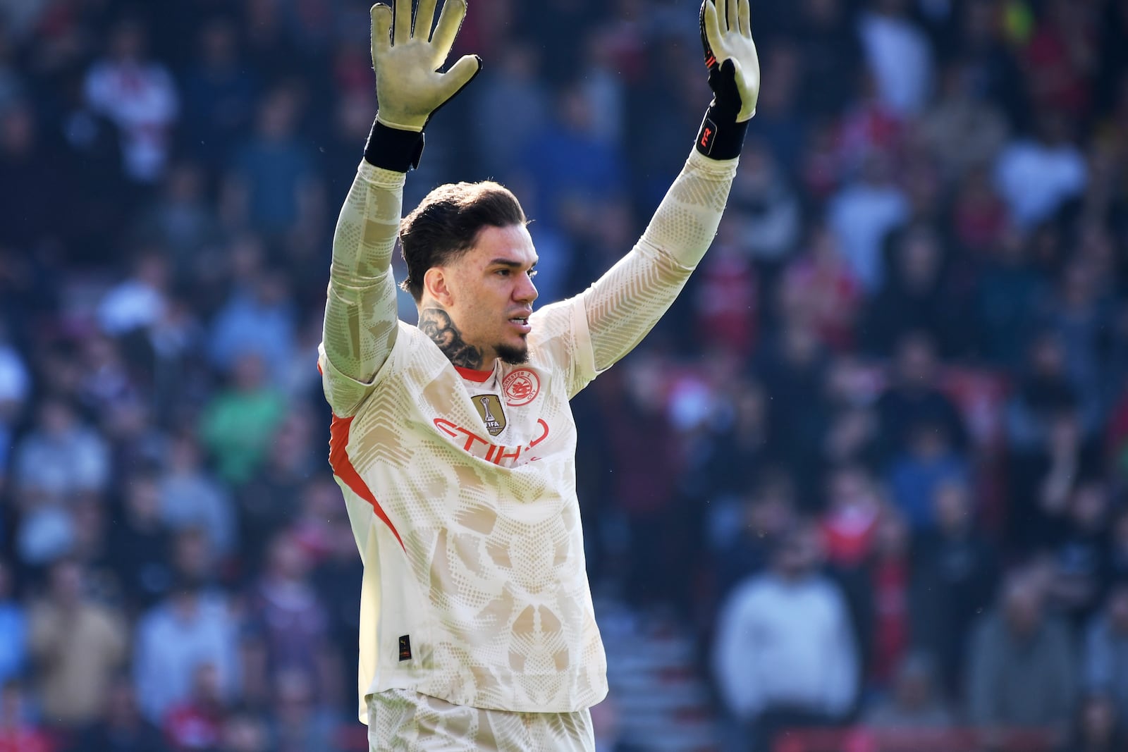 Manchester City's goalkeeper Ederson gestures during the English Premier League soccer match between Nottingham Forest and Manchester City at the City Ground stadium, in Nottingham, England, Saturday, March 8, 2025. (AP Photo/Rui Vieira)