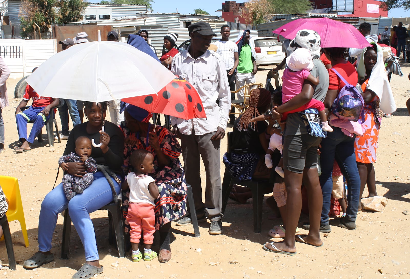 Namibians queue to cast their votes in a presidential election, in Windhoek, Namibia, Wednesday, Nov. 27, 2024. (AP Photo/Esther Mbathera)