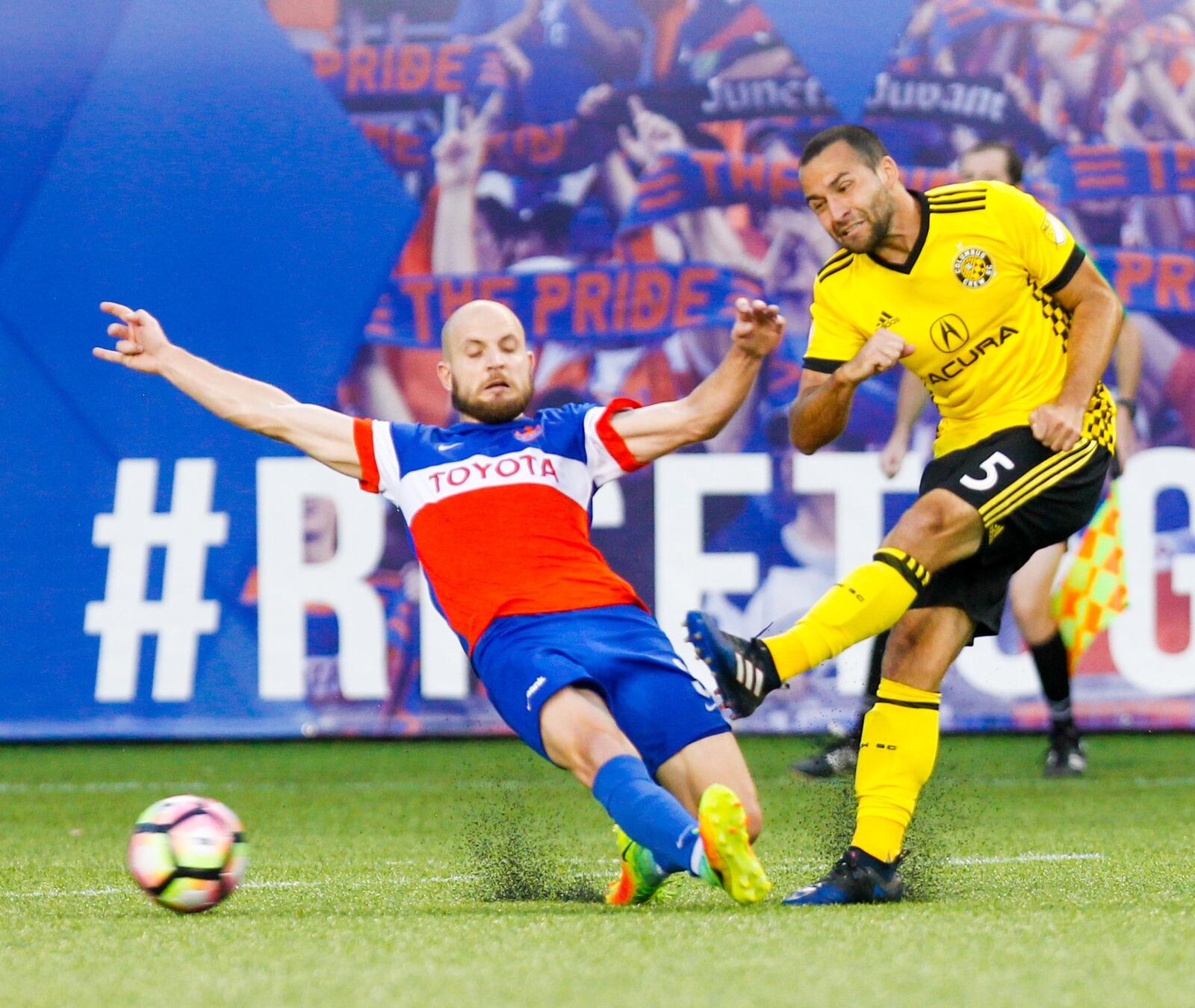 FC Cincinnati defenseman Tyler Polak (3) tries to block a pass by Columbus Crew midfielder Dilly Duka (5) during their Open Cup match held at Nippert Stadium on the campus of the University of Cincinnati, Wednesday, June 14, 2017. GREG LYNCH / STAFF