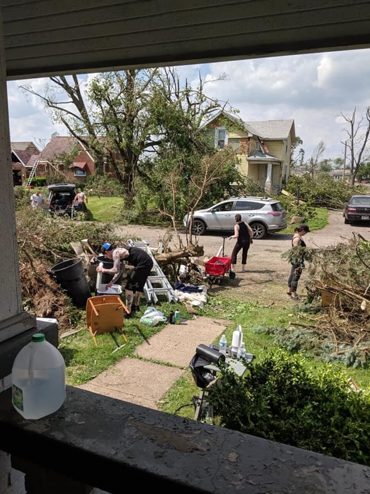 Photos: Community rallies around Dayton restaurant owner after son’s death, tornado