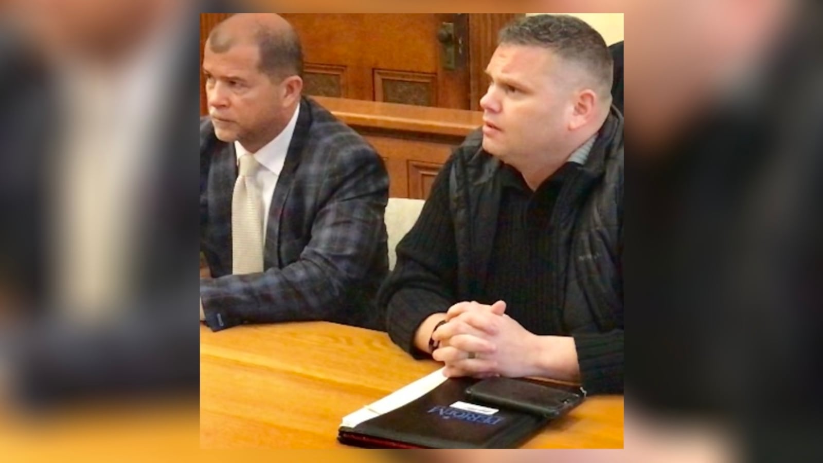 Former Piqua police officer Justin Augustine, right, pleaded guilty Dec. 5, 2018, to reduced charges in Miami County Municipal Court after he was charged with driving under the influence for an Oct. 27 crash that happened in a cruiser while he was on duty.