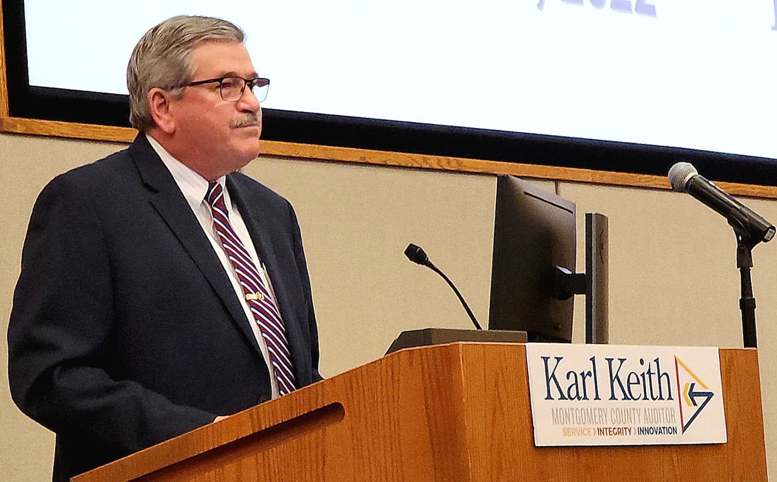 Montgomery County Auditor Karl Keith speaks at Sinclair Community College Thursday, Dec. 15, 2022. Keith provided details of a triennial update to property values set to occur in 2023. ERIC SCHWARTZBERG/STAFF