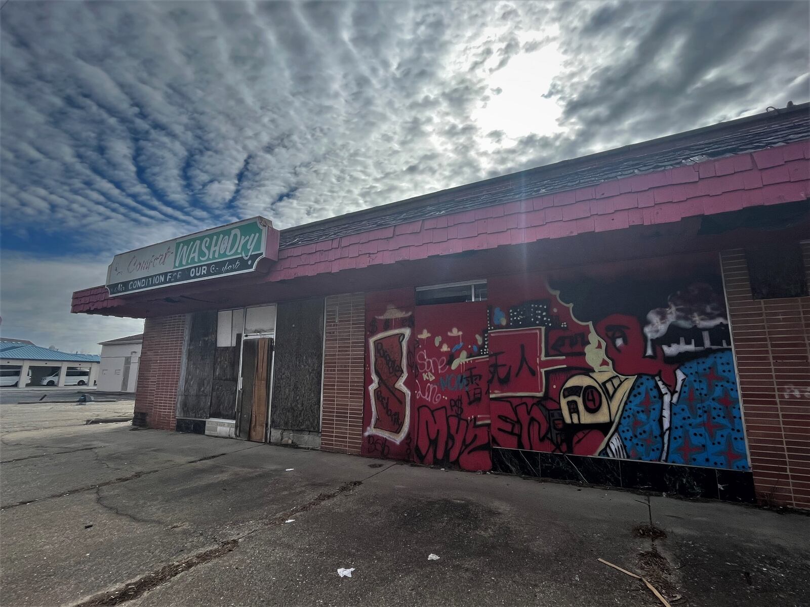 A vacant property at 2118 Germantown St. in West Dayton. A new healthy family market and coffee and smoothie shop is proposed at the site. CORNELIUS FROLIK / STAFF