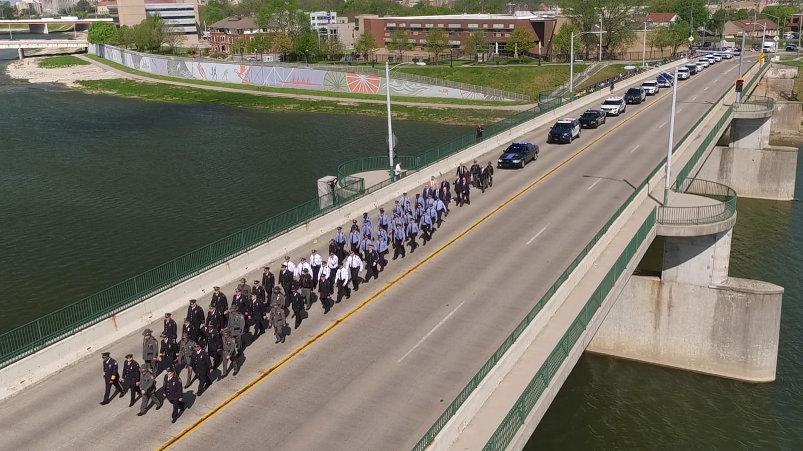 The 12th Annual Montgomery County Law Enforcement Officer Memorial Ceremony took place at RiverScape in Dayton on Friday morning after a parade of law enforcement members, a Scottish bagpipe and drum band and 20 vehicles came across the Riverside Drive Bridge.   TY GREENLEES / STAFF