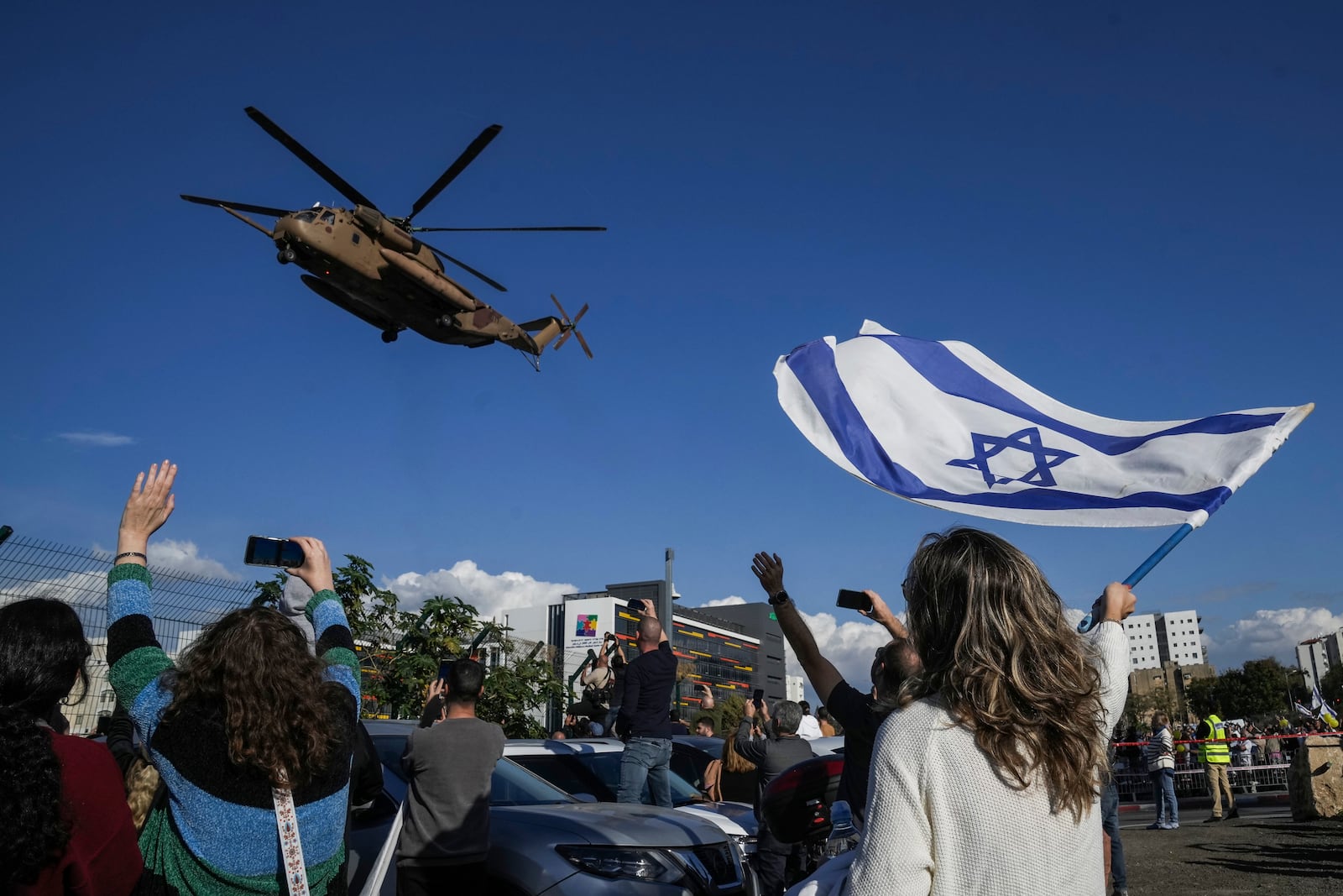 An Israeli military helicopter, carrying the four Israeli female soldier released from Gaza, arrives to the Beilinson hospital in Petah Tikva, near Tel Aviv, Israel, Saturday, Jan. 25, 2025. (AP Photo/Maya Alleruzzo)