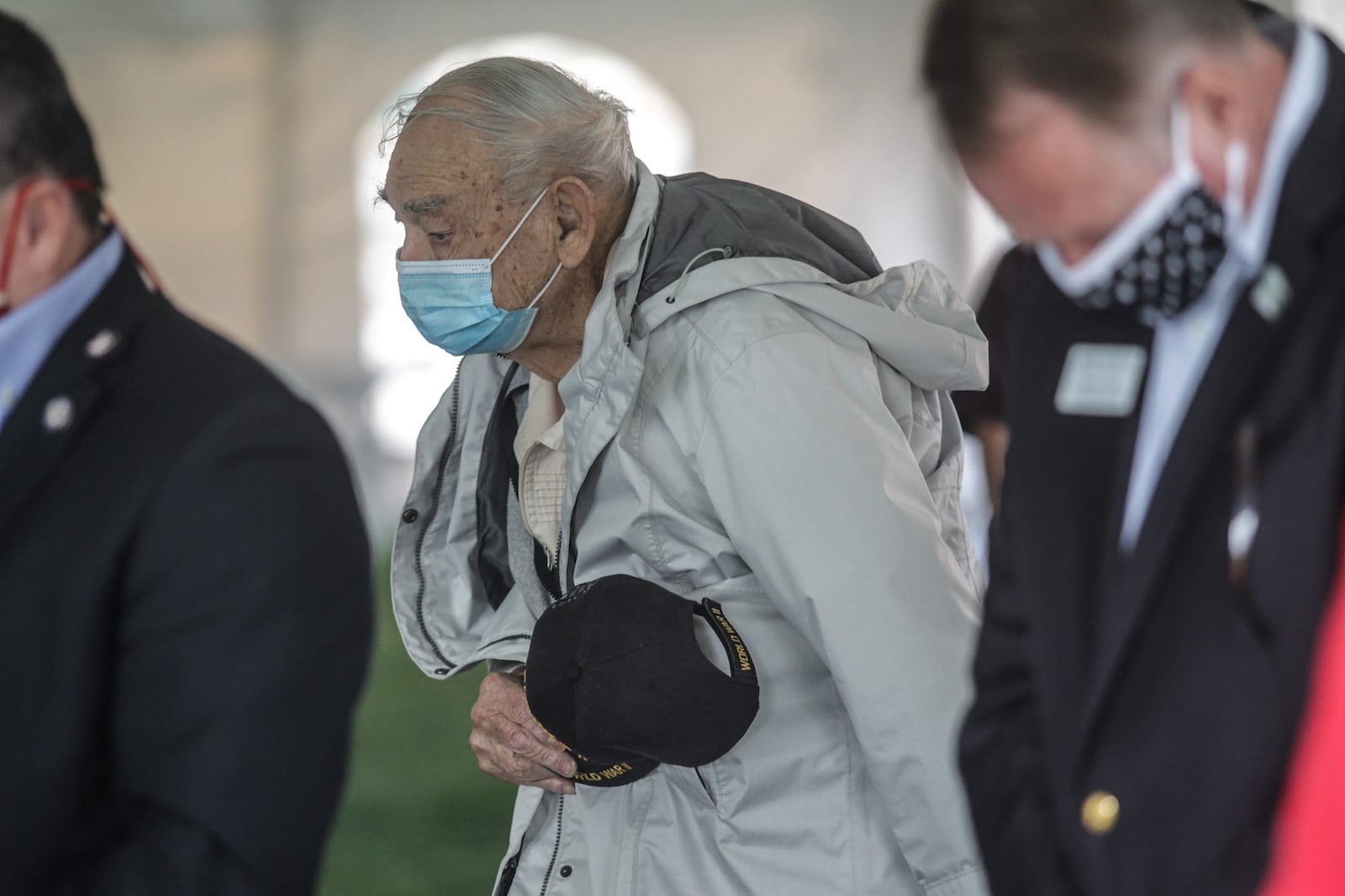 World War ll veteran Harry Kohlbacher, of  Dayton, prays during the invocation held during a Veterans Day ceremony at the Dayton VA Medical Center Wednesday, Nov. 11, 2020.