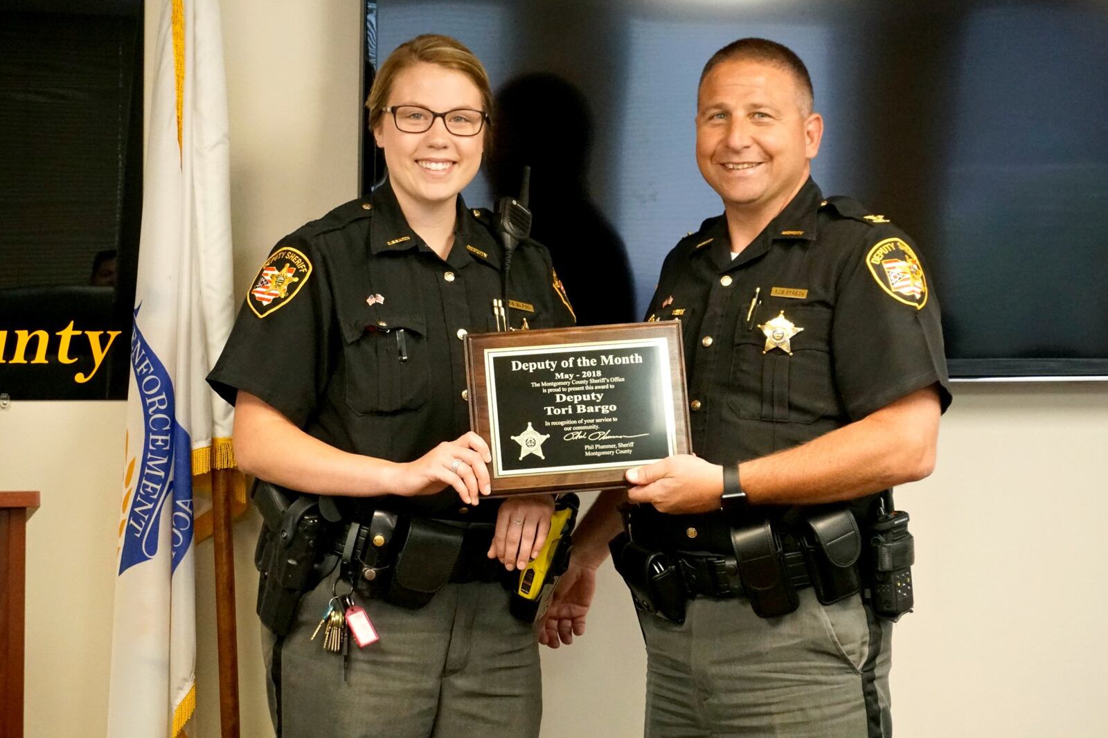 Deputy Tori Bargo, left, receives the May 2018 Deputy of the Month award from then Chief Deputy Rob Streck.  Streck assumed the role of sheriff on Jan. 1, 2019. (PHOTO FROM MONTGOMERY COUNTY SHERIFF'S OFFICE FACEBOOK)