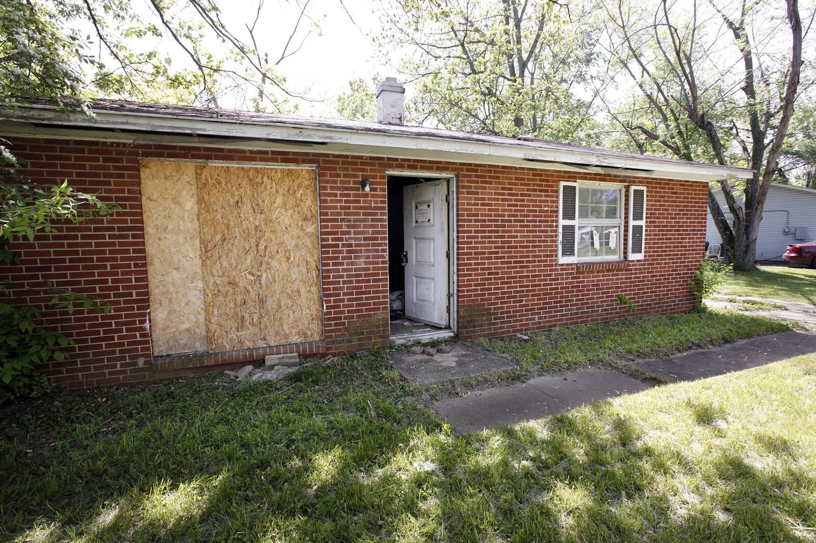 This vacant, dilapidated house at 1538 Midwood Ave. in Trotwood will be rehabbed through a program operated by the Trotwood Community Improvement Corp. TY GREENLEES / STAFF