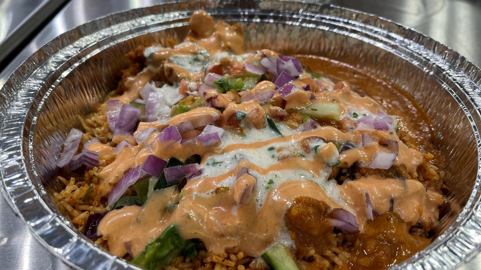 The Twist Indian Grill, a new fast-casual Indian restaurant where customers can create their own bowls and burritos, is holding a grand opening Thursday, Oct. 20 at 2627 S. Smithville Road (CONTRIBUTED PHOTO).