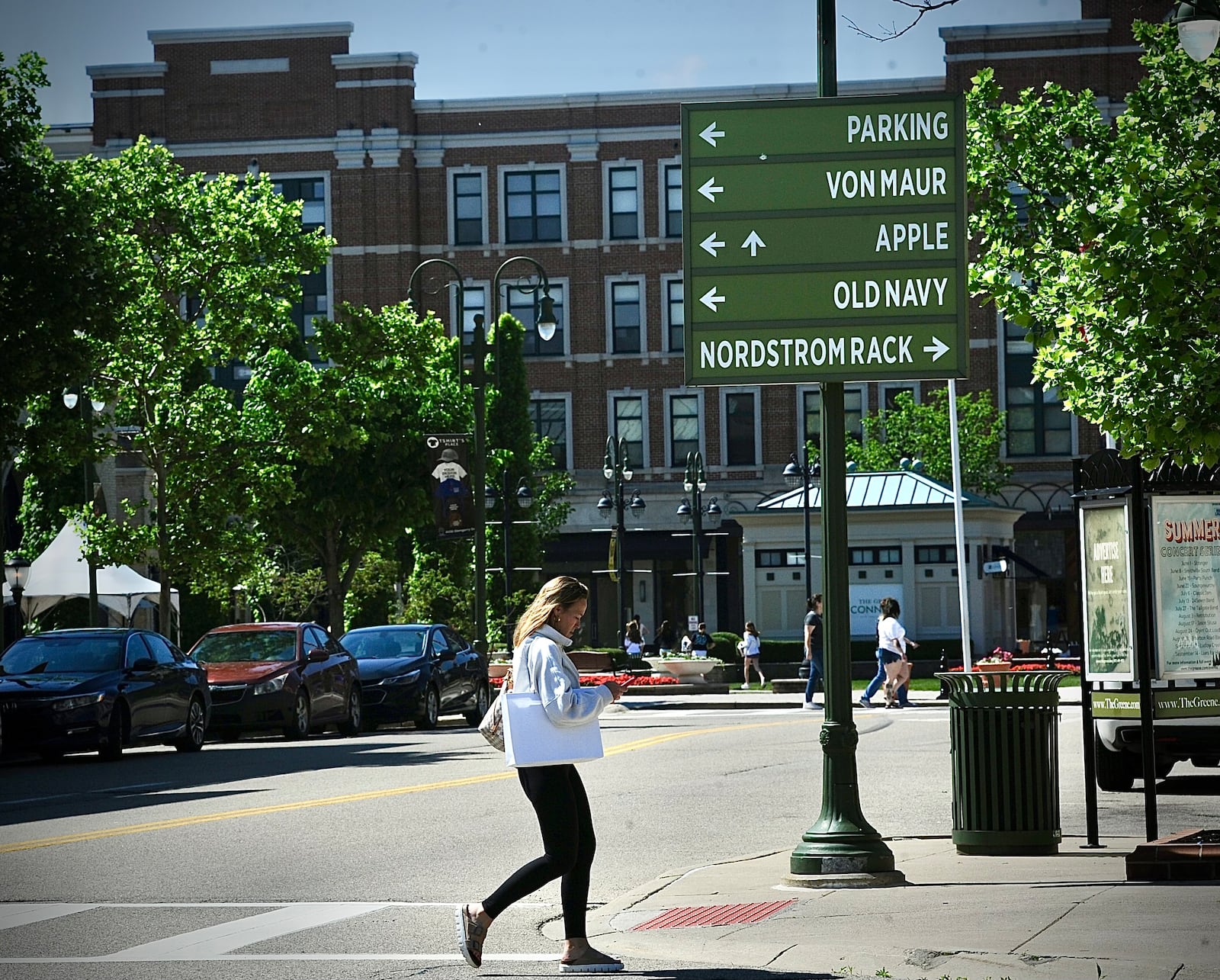 Signage points shoppers to some of the 100-plus stores and restaurants at The Greene Town Center in Beavercreek on Tuesday, May 16, 2024. MARSHALL GORBY / STAFF