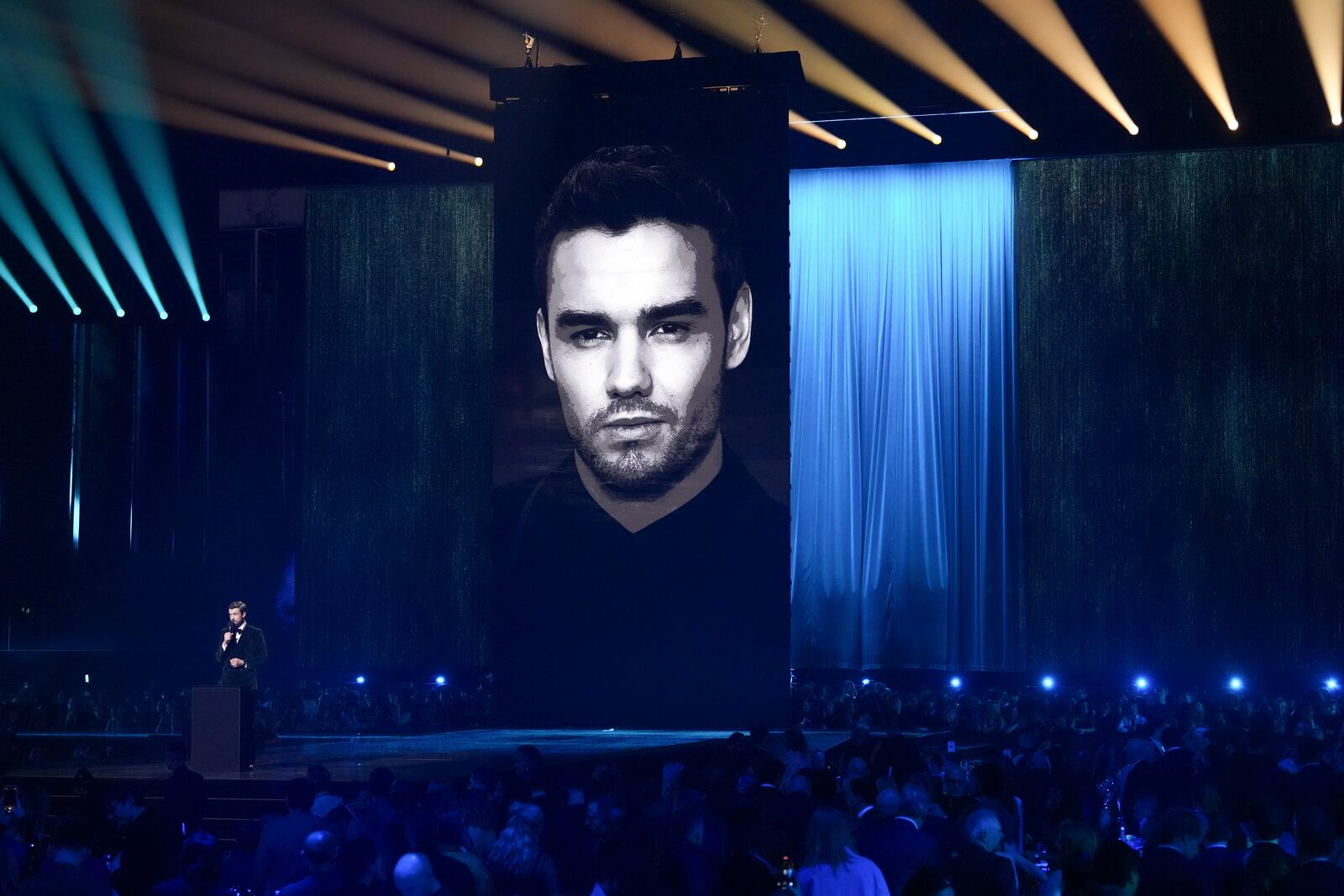 Host Jack Whitehall pays tribute to Liam Payne during the Brit Awards 2025 in London, Saturday, March.1, 2025. (Photo by Scott A Garfitt/Invision/AP)