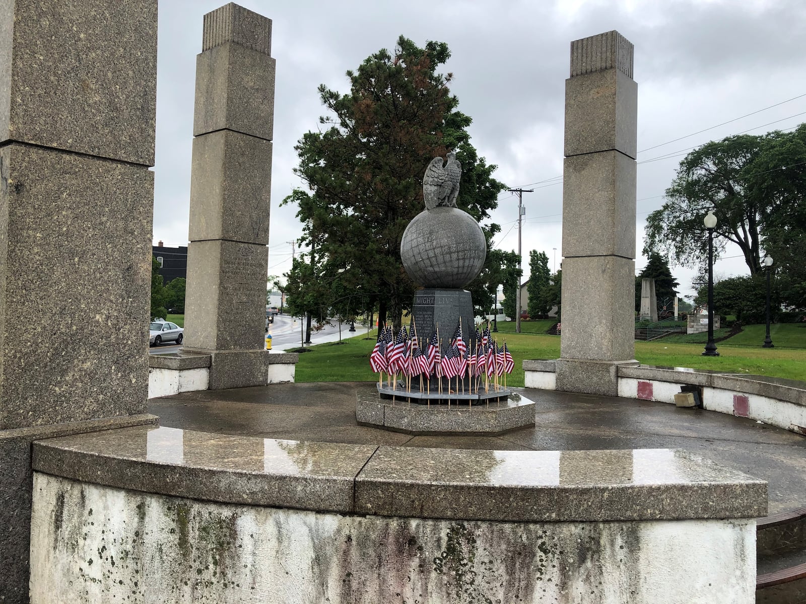 A war memorial in Old North Dayton that used to be on a traffic island but now is connected to a city park. CORNELIUS FROLIK / STAFF