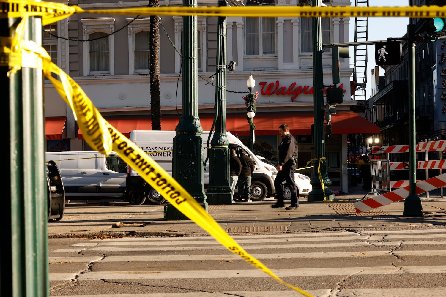 Emergency personnel at the scene, hours after a man drove a pickup truck into people in the French Quarter of New Orleans, on Wednesday, Jan. 1, 2025. (Edmund D. Fountain/The New York Times)