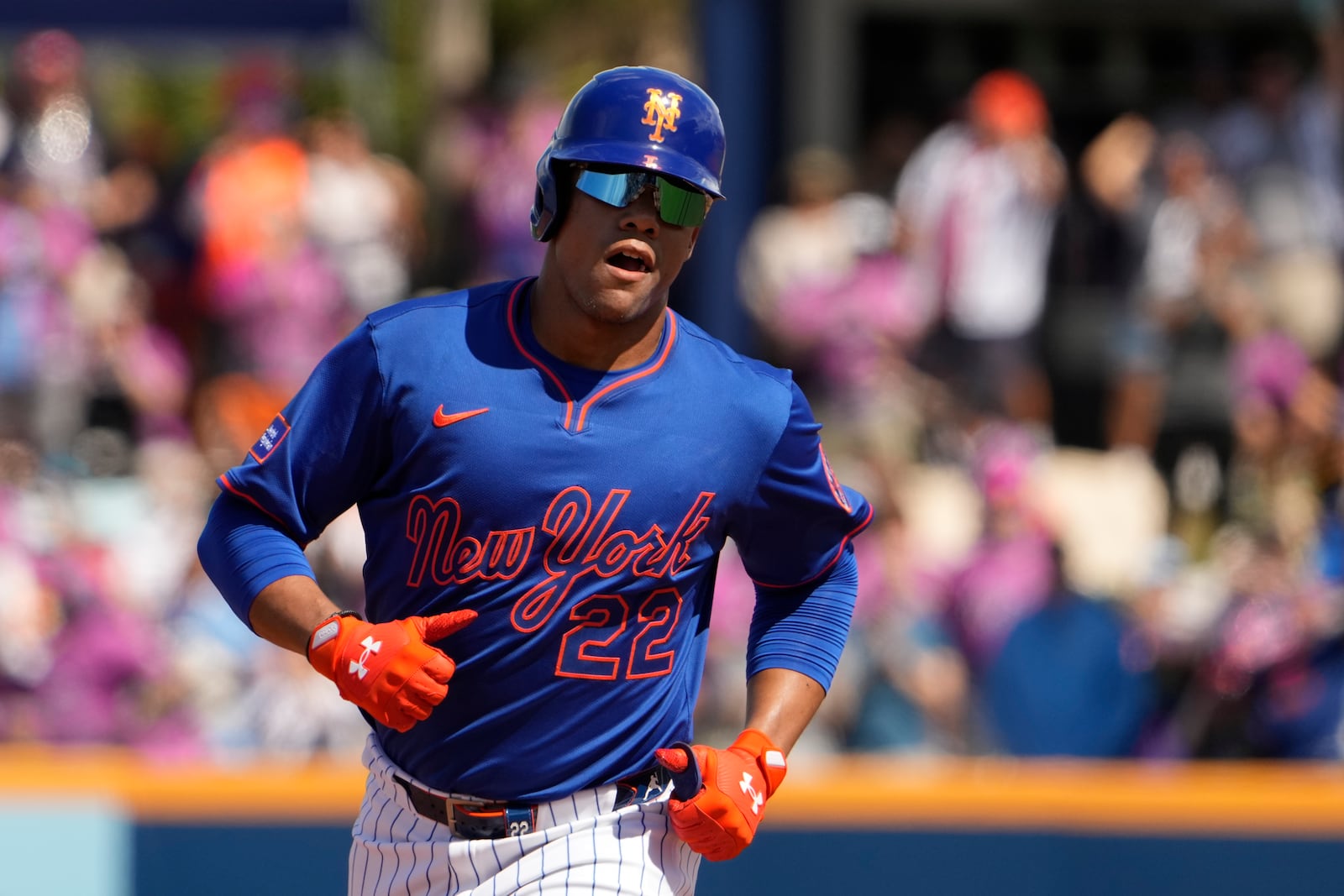 New York Mets' Juan Soto rounds the bases after hitting a solo home run during the first inning of a spring training baseball game against the Houston Astros Saturday, Feb. 22, 2025, in Port St. Lucie, Fla. (AP Photo/Jeff Roberson)