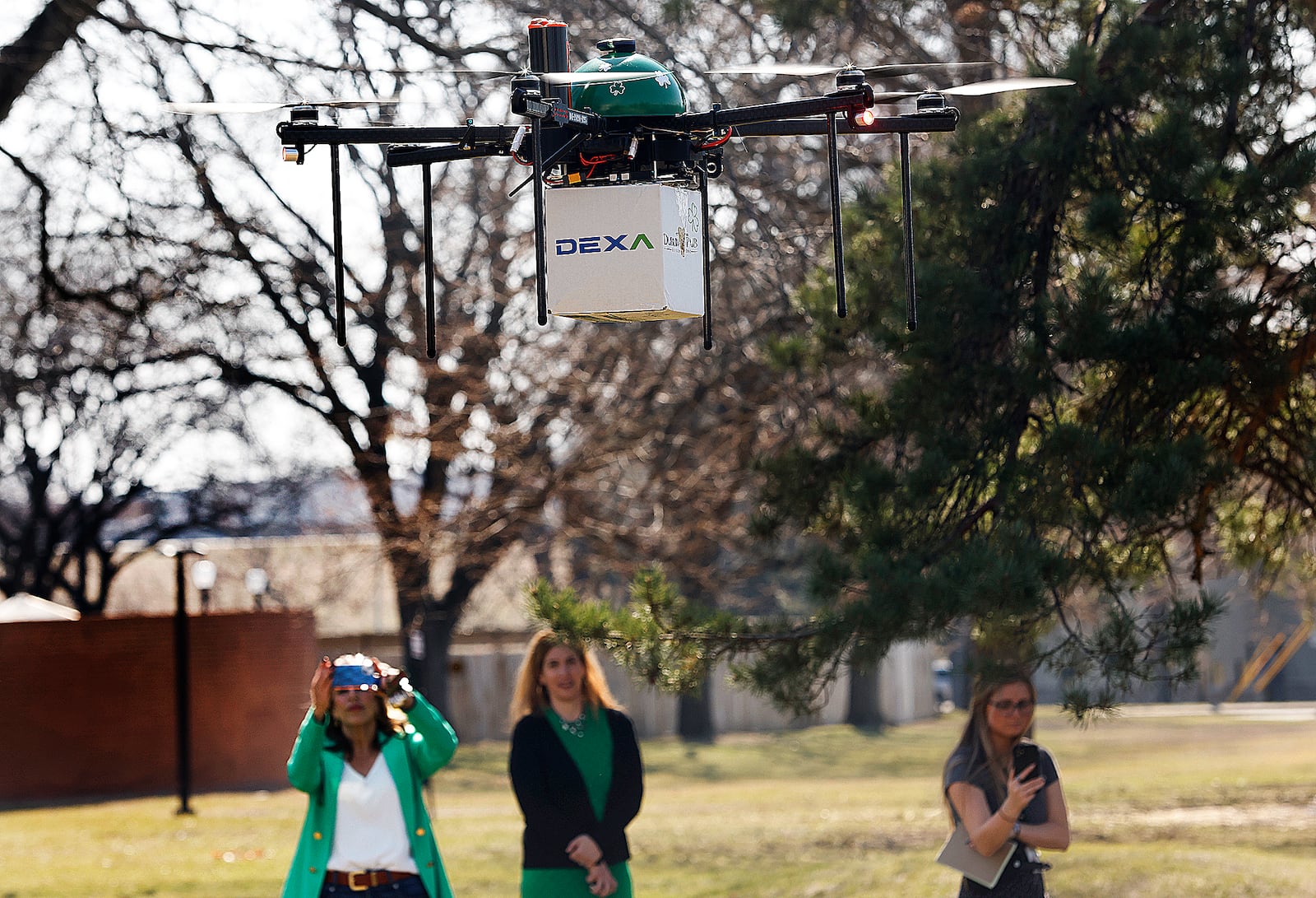 To help kick off the upcoming St. Patrick’s Day festivities at the Dublin Pub, DEXA, formerly known as Drone Express, delivered a lunch of fish and chips via drone to Dayton Mayor Jeffrey J. Mims Jr. on Thursday, March 13. MARSHALL GORBY\STAFF