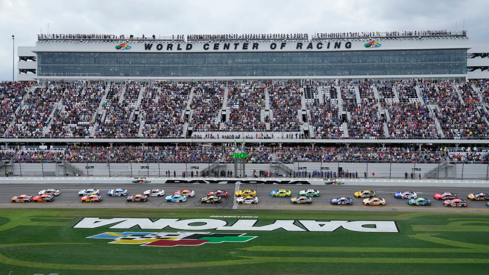 Chase Briscoe (19) leads the field at the start of the NASCAR Daytona 500 auto race Sunday, Feb. 16, 2025, at Daytona International Speedway in Daytona Beach, Fla. (AP Photo/Chris O'Meara)