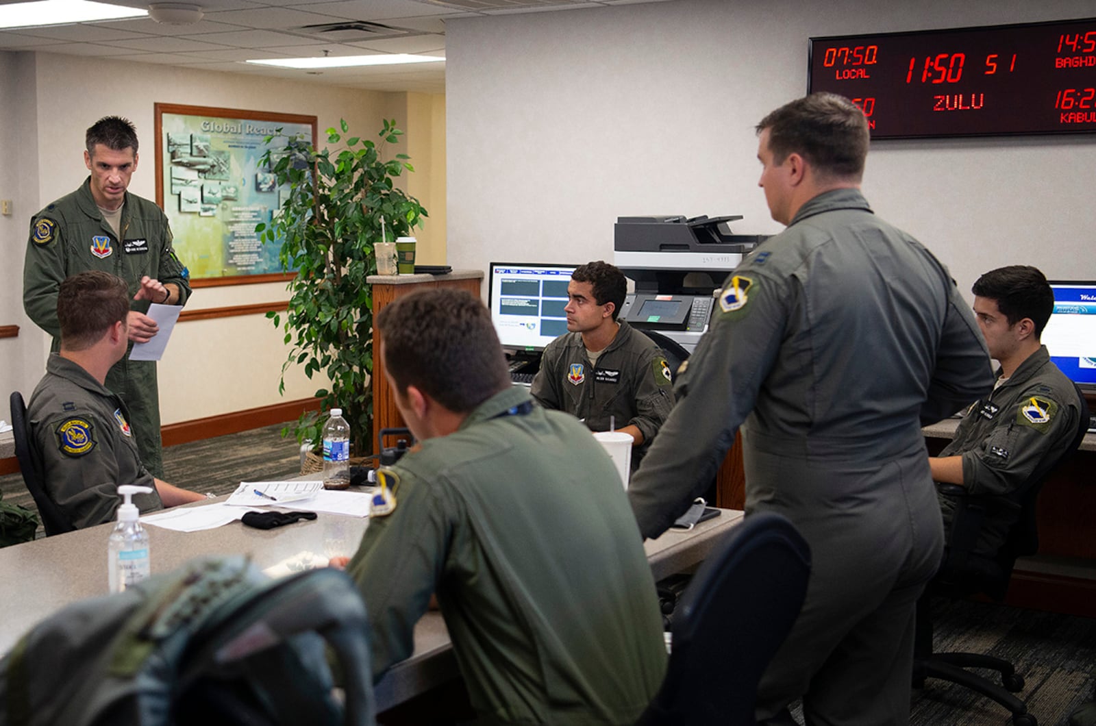 U.S. Air Force F-22 Raptor pilots brief in the Wright-Patterson Air Force Base operations building Aug.26 prior to taking off for home. (U.S. Air Force photo/R.J. Oriez)