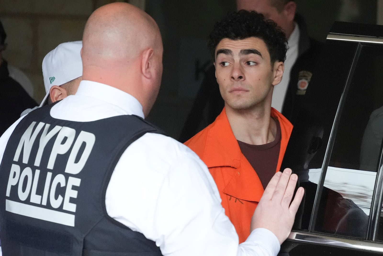 Luigi Nicholas Mangione leaves at Blair County Courthouse in Hollidaysburg, Pa., Thursday, Dec. 19, 2024. (AP Photo/Gene J. Puskar, Pool)